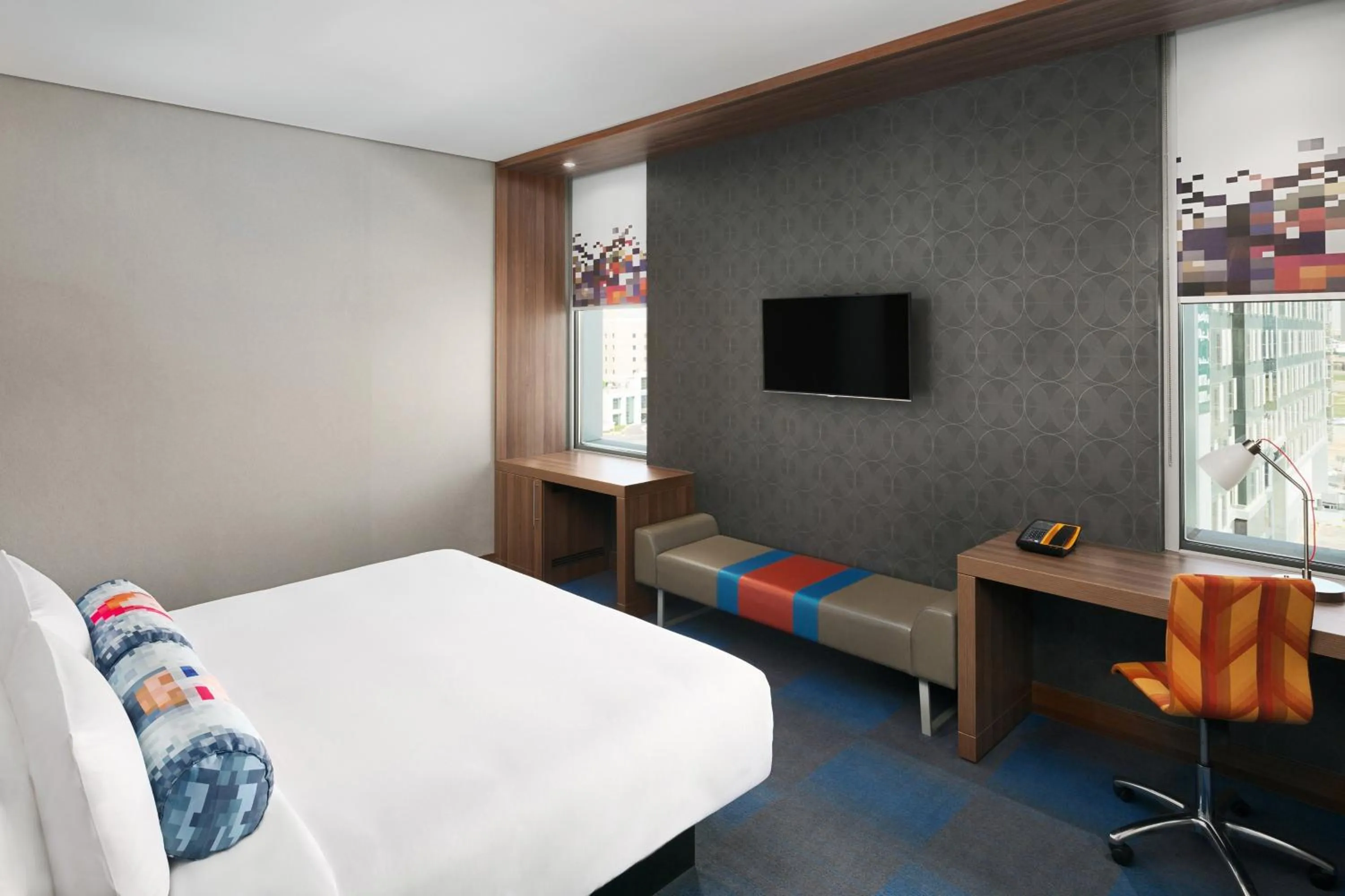 Photo of the whole room, Bed in Aloft Dhahran Hotel