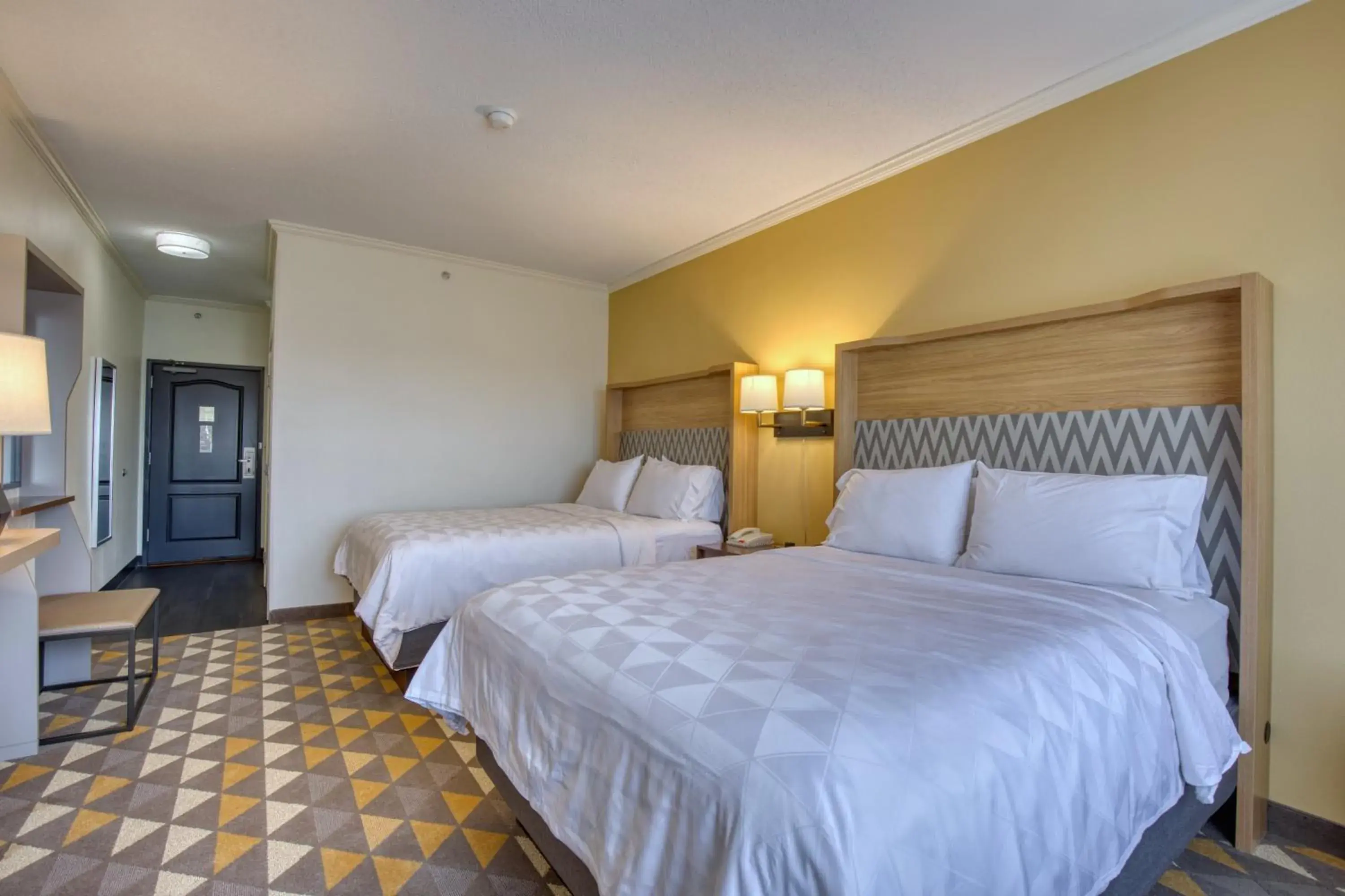 Standard Queen Room with Two Queen Beds and Accessible Roll-In Shower in Holiday Inn Hotel & Suites Madison West - Middleton by IHG Standard Queen Room with Two Queen Beds and Accessible Roll-In Shower in Holiday Inn Hotel & Suites Madison West - Middleton by IHG
