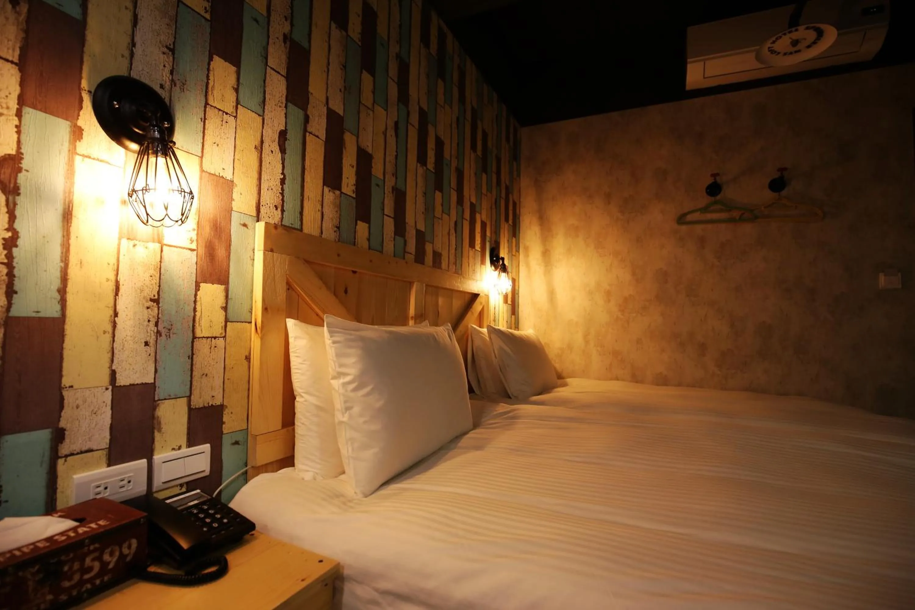 Decorative detail, Bed in NYS Loft Hotel