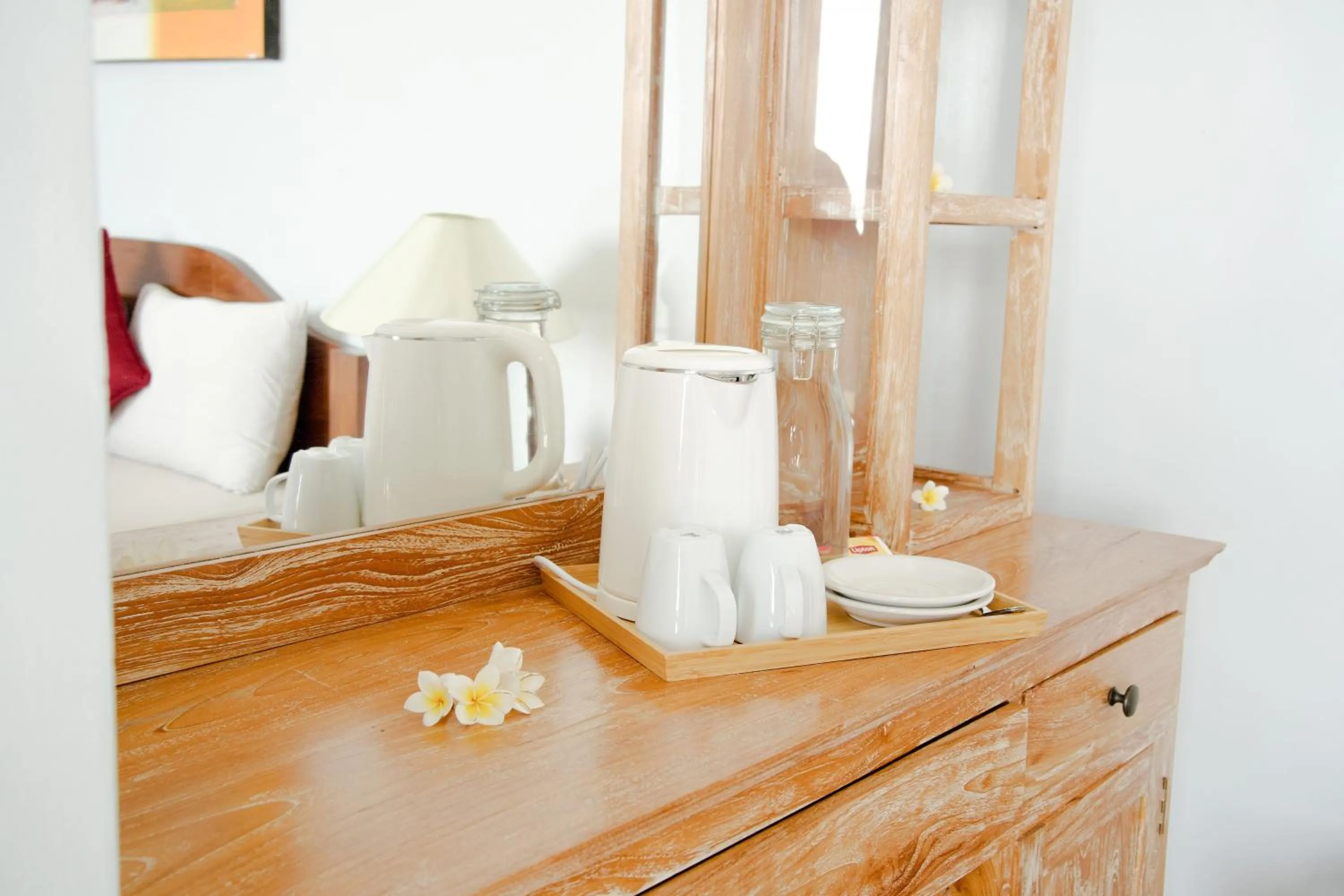 Coffee/tea facilities, Bed in Alam Bali Beach Resort