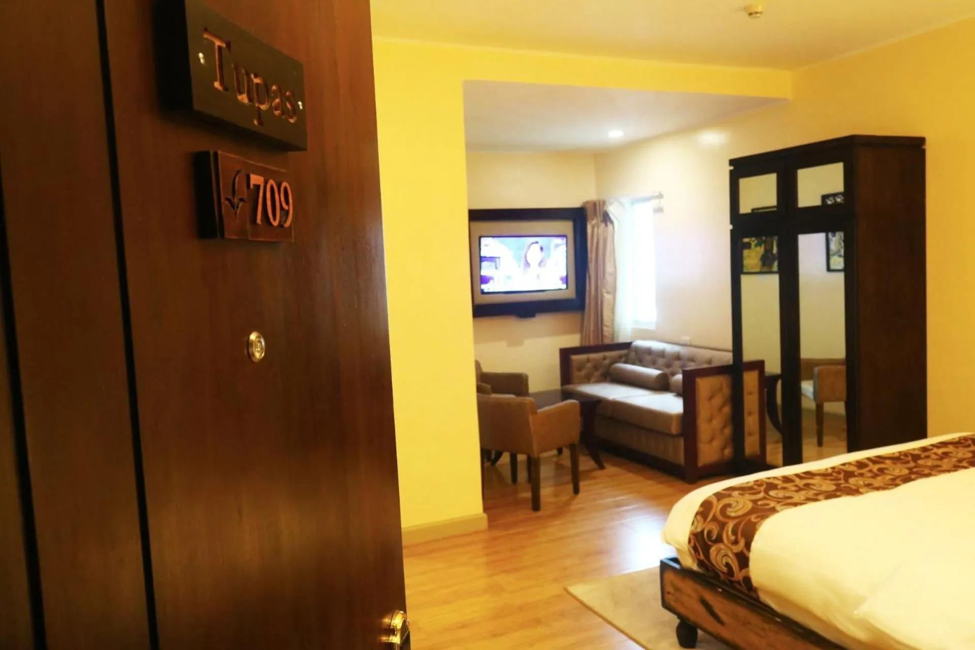 TV/Entertainment Center in Palm Grass Hotel