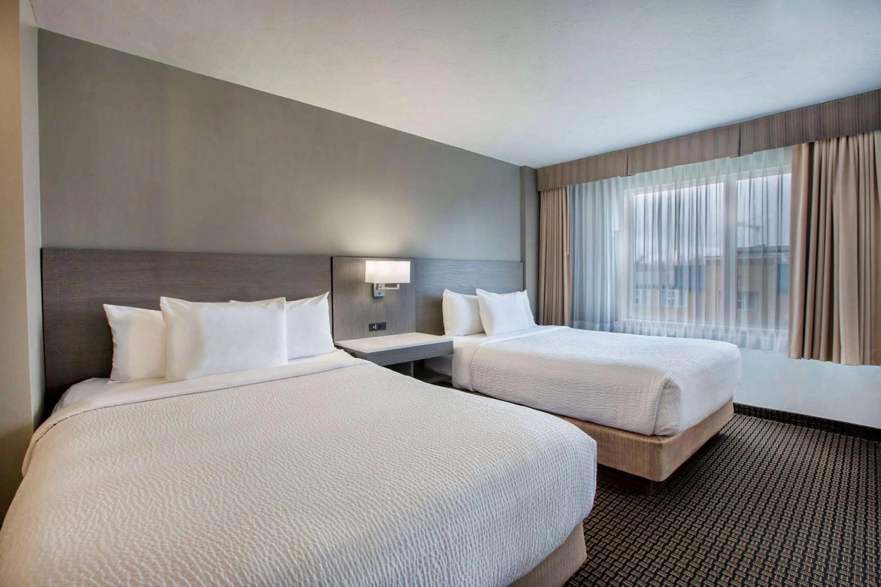 Photo of the whole room, Bed in Days Inn & Suites by Wyndham Moncton