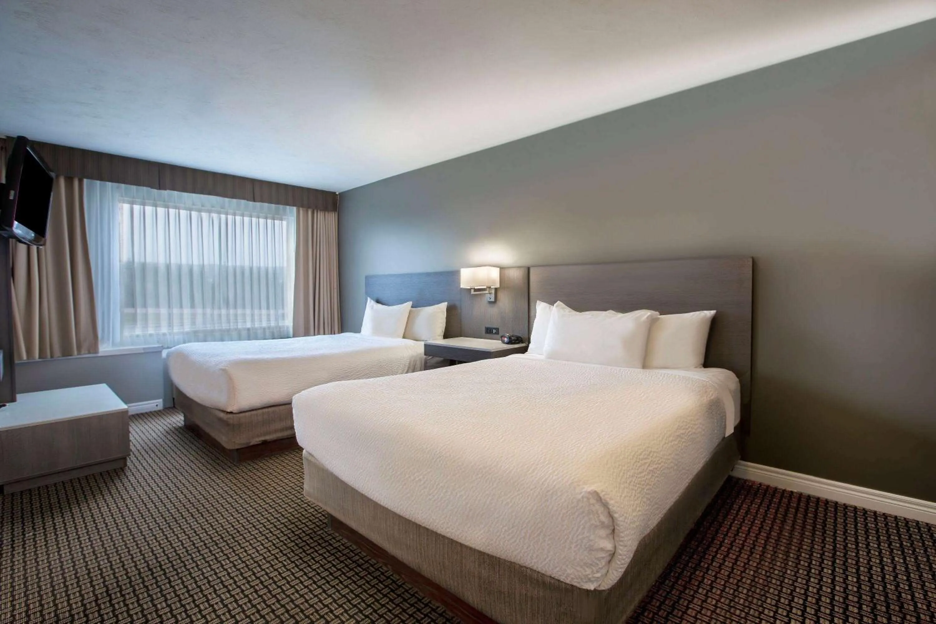 Photo of the whole room, Bed in Days Inn & Suites by Wyndham Moncton