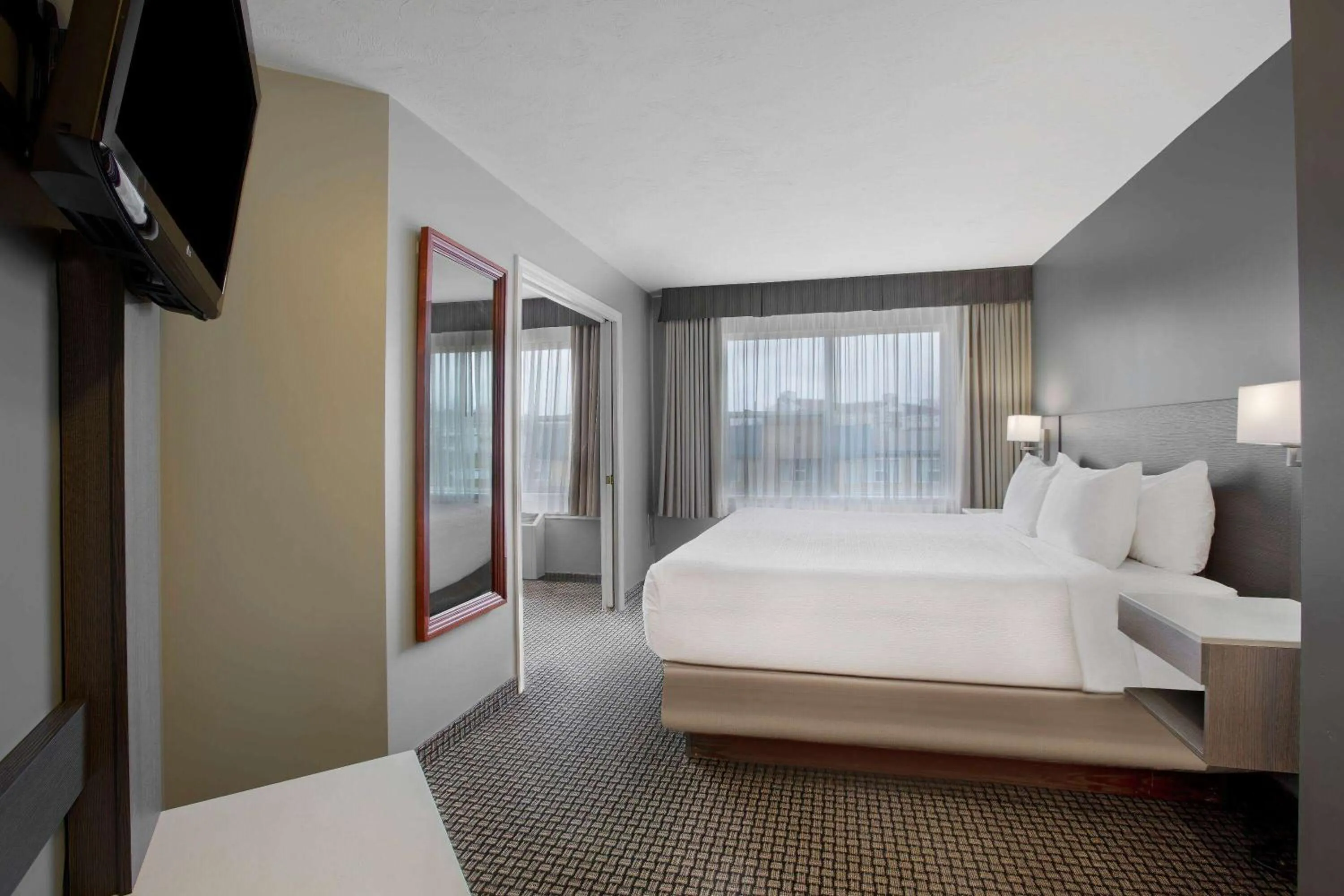 Photo of the whole room, Bed in Days Inn & Suites by Wyndham Moncton