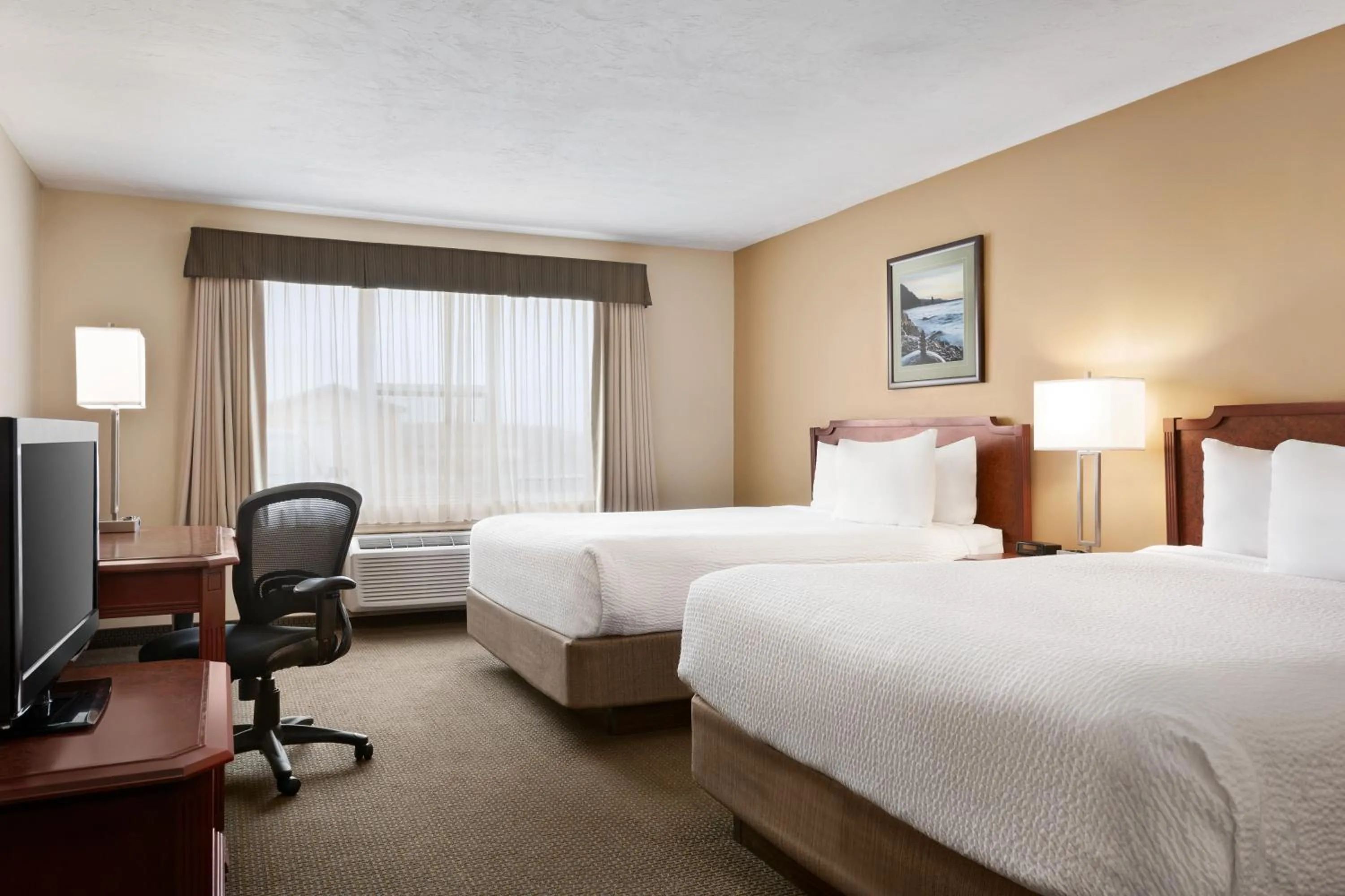 Photo of the whole room, Bed in Days Inn & Suites by Wyndham Moncton