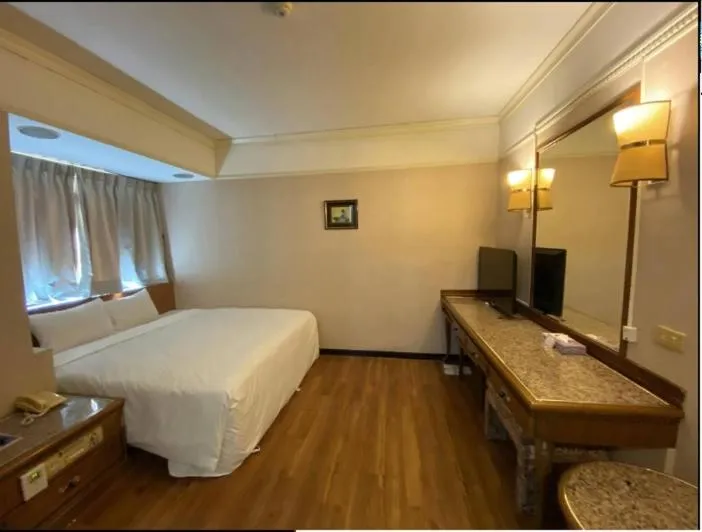Bed in Tapeng Bay Holiday Hotel