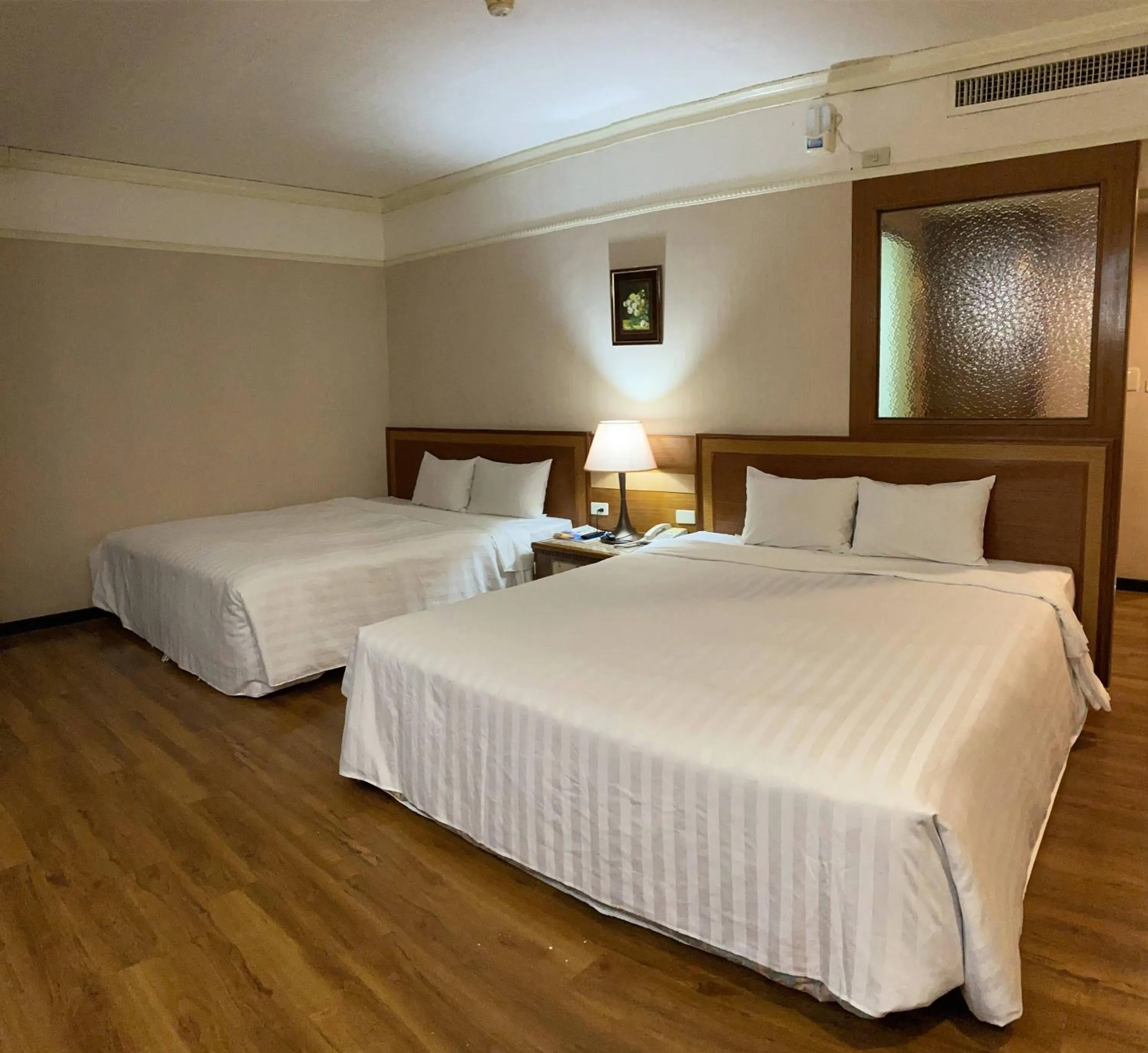 Bed in Tapeng Bay Holiday Hotel