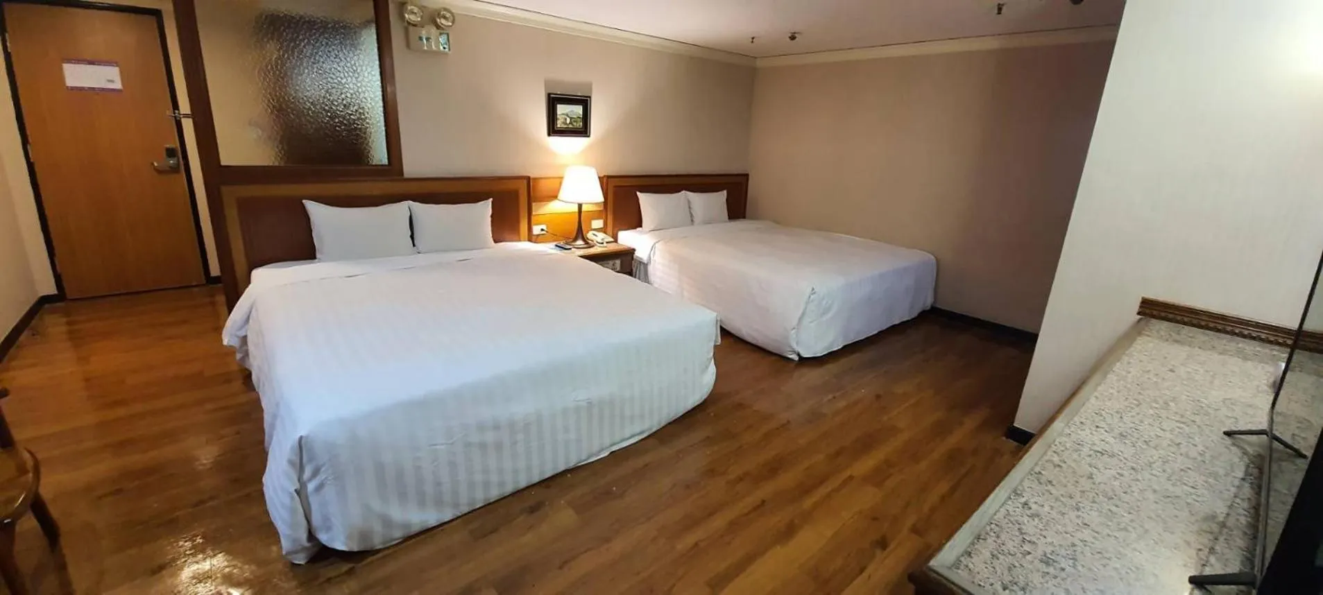 Bed in Tapeng Bay Holiday Hotel