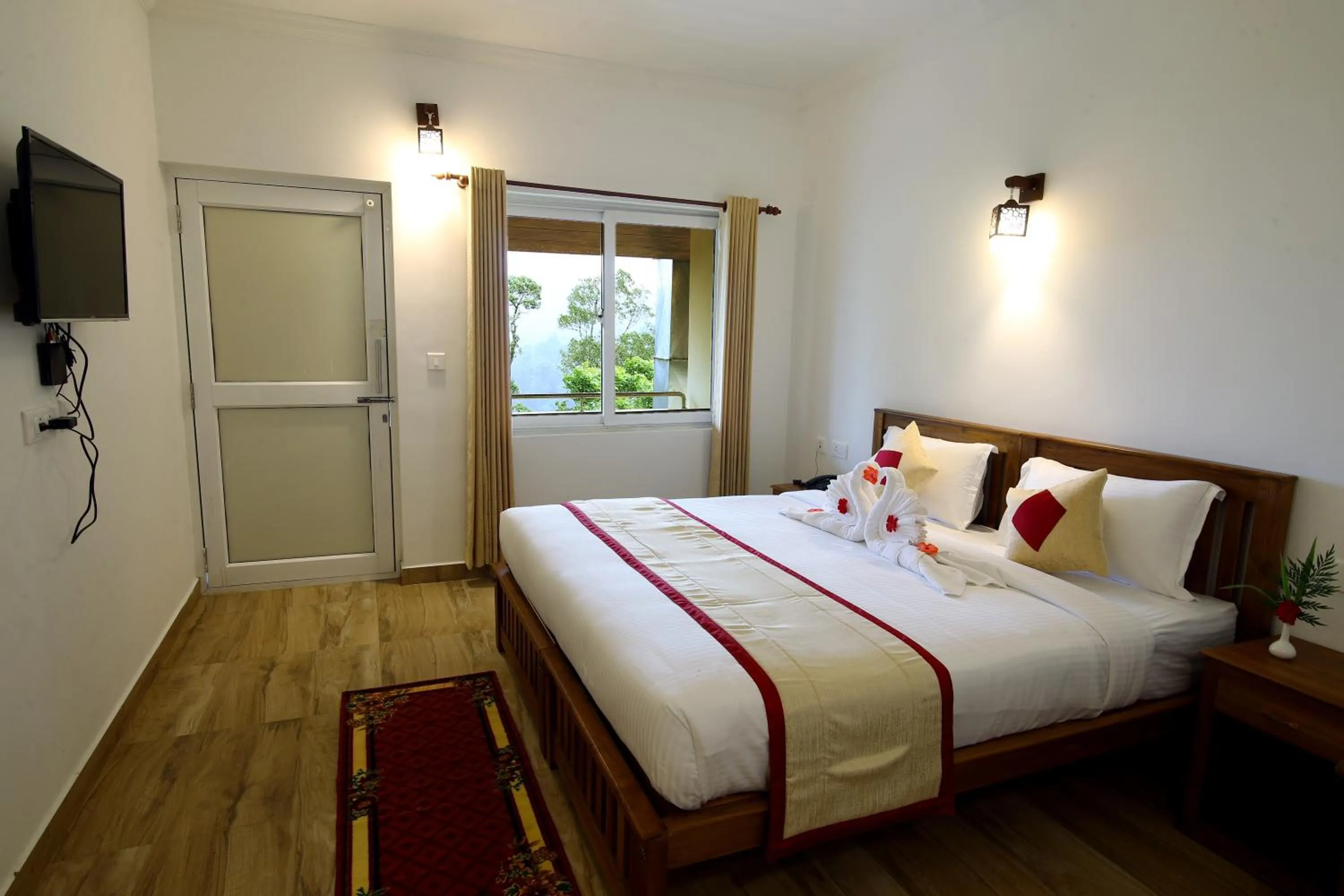 Bed in Dew Drops Farm Resorts