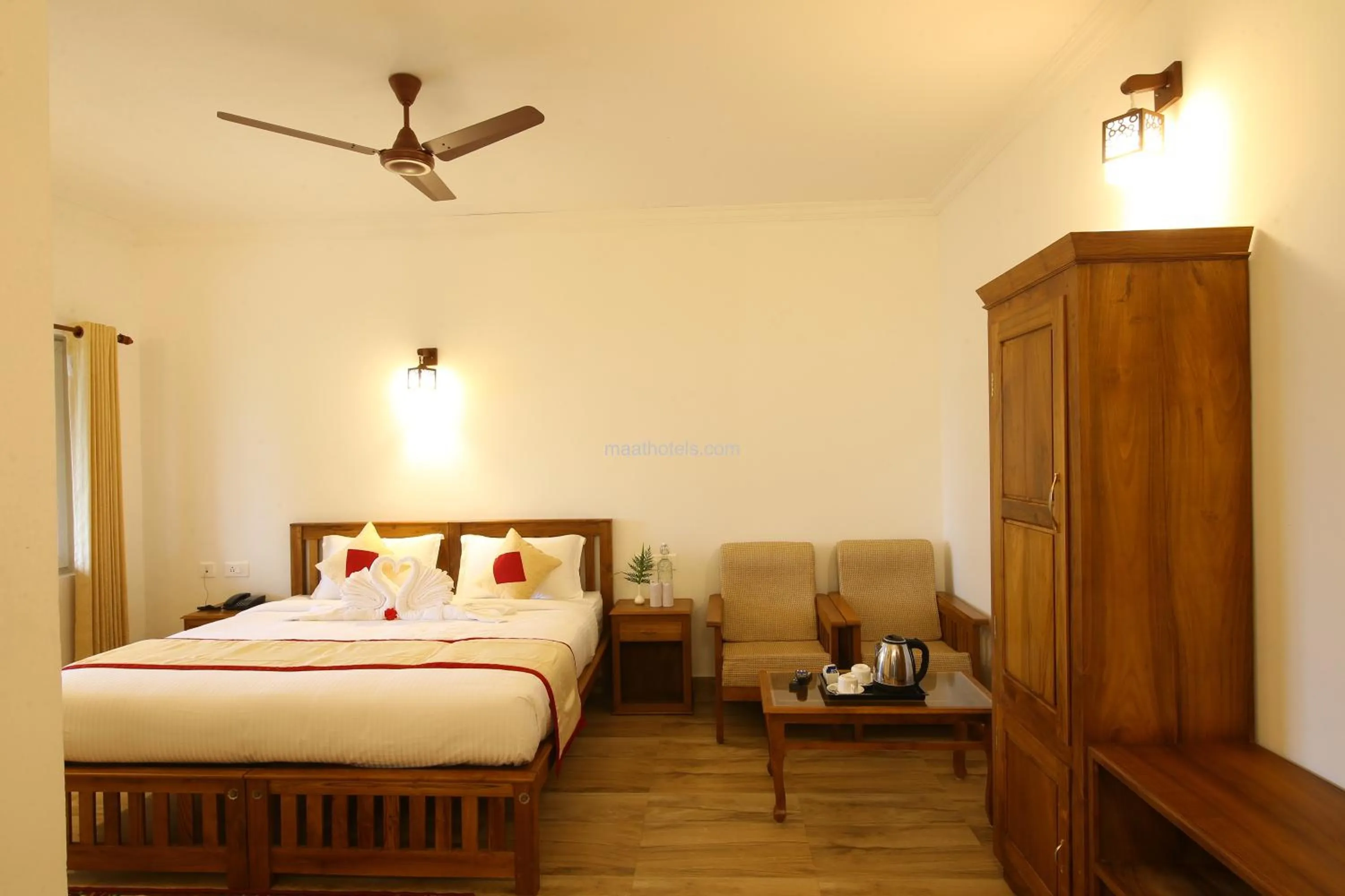 Bed in Dew Drops Farm Resorts