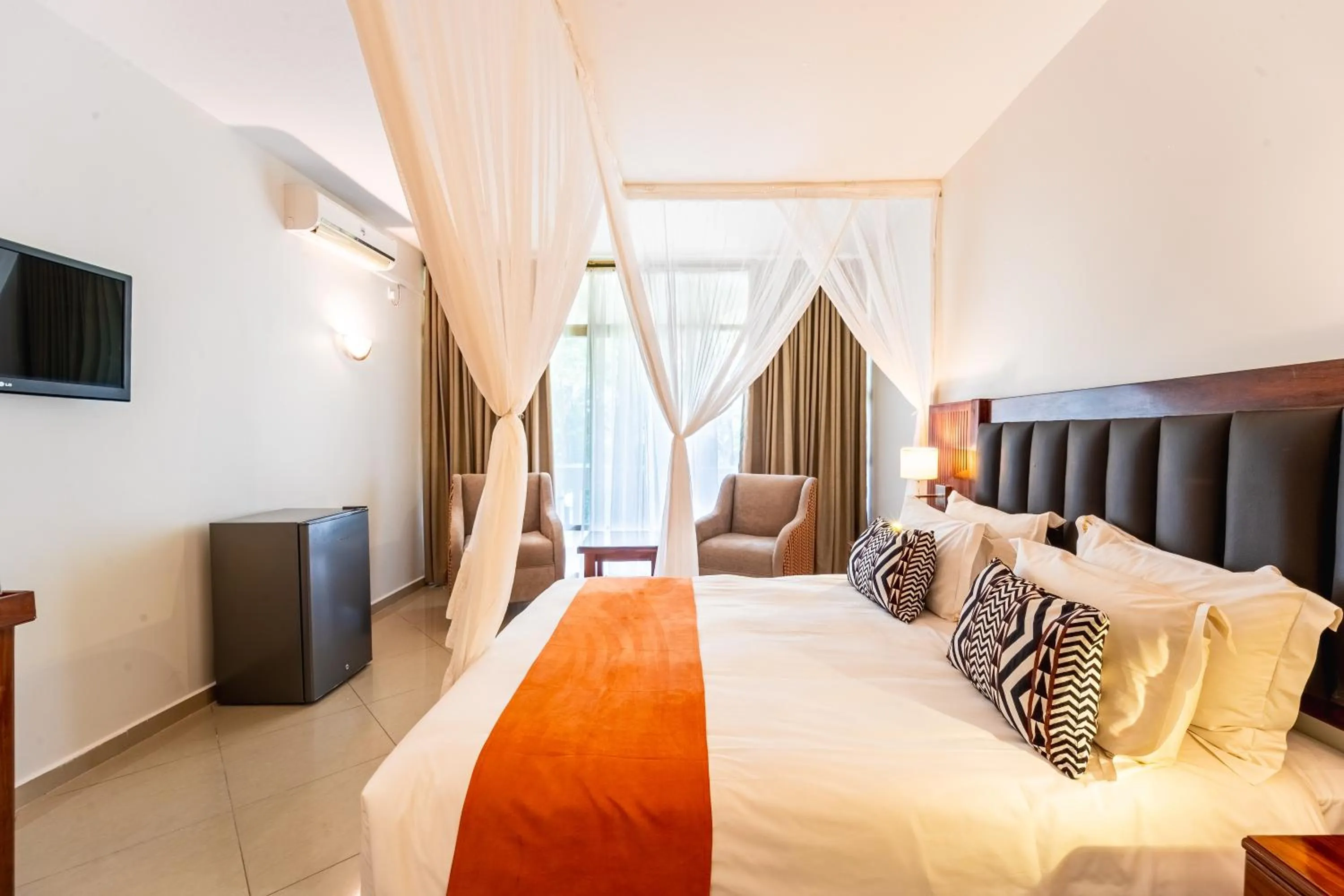 Bed in Victoria Falls Rainbow Hotel