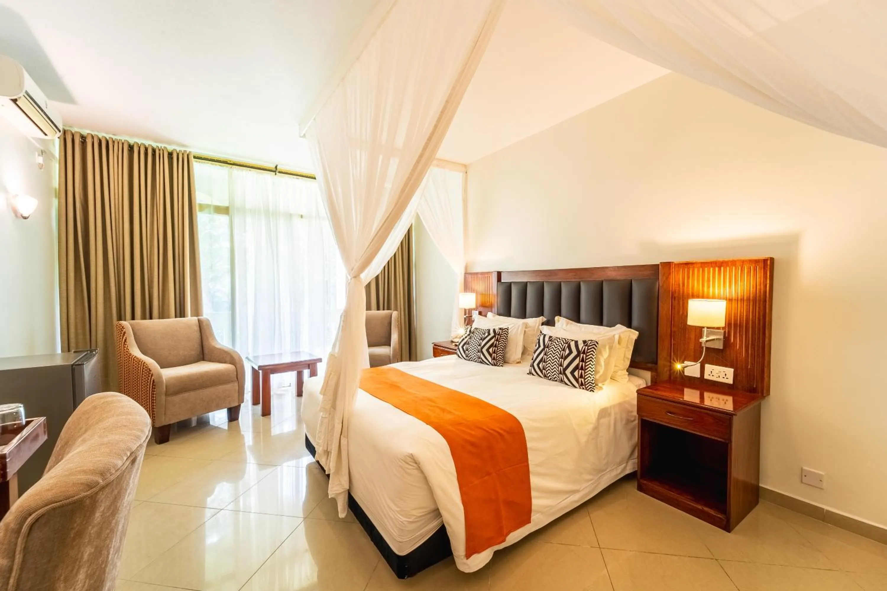 Bed in Victoria Falls Rainbow Hotel