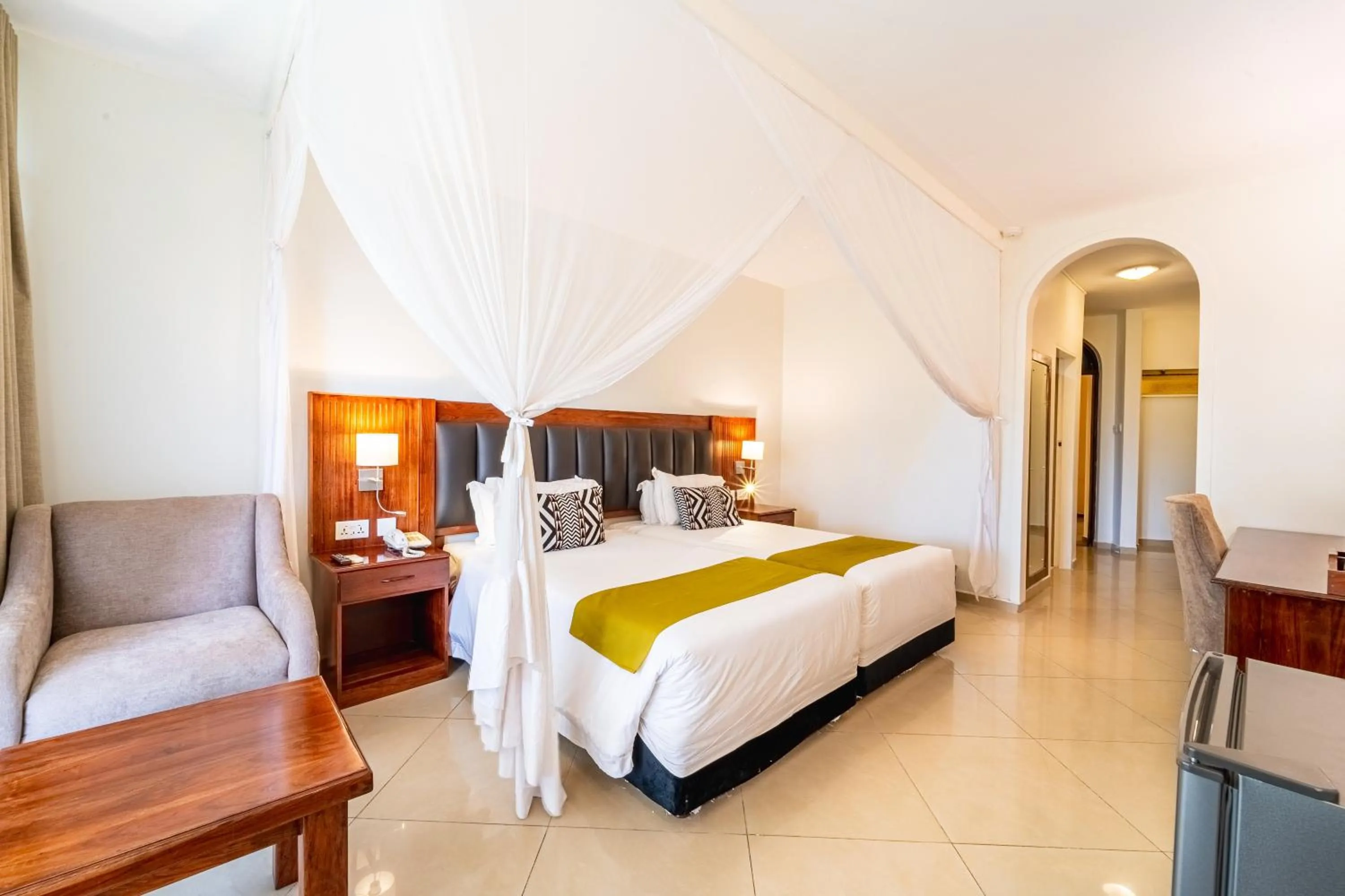 Bed in Victoria Falls Rainbow Hotel