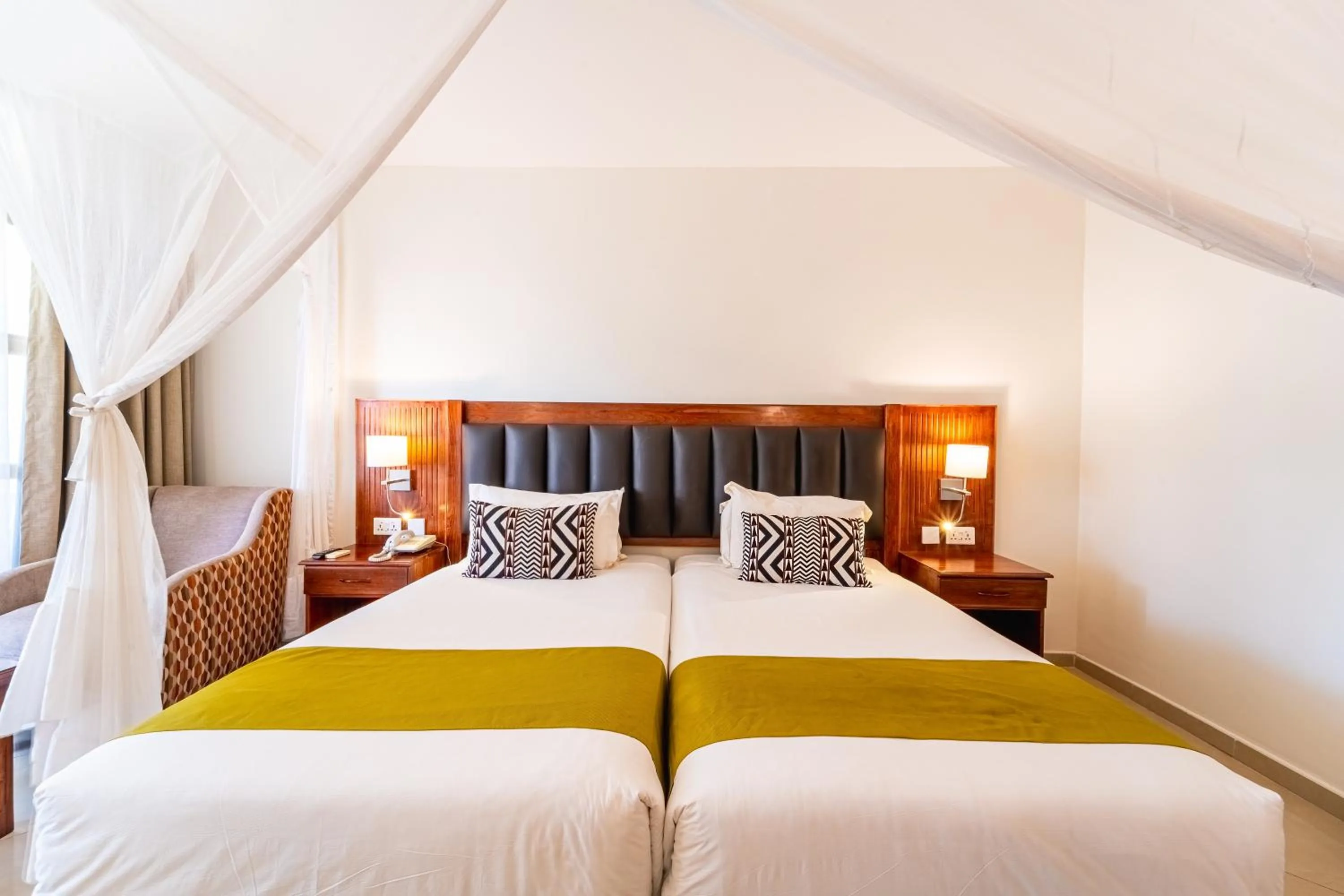 Bed in Victoria Falls Rainbow Hotel