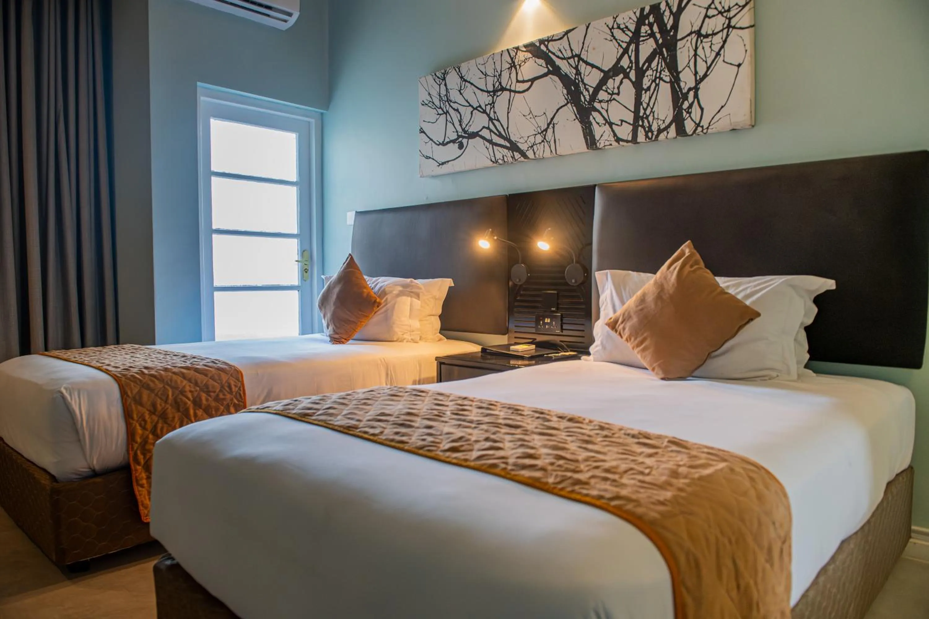 Bed in New Ambassador Hotel