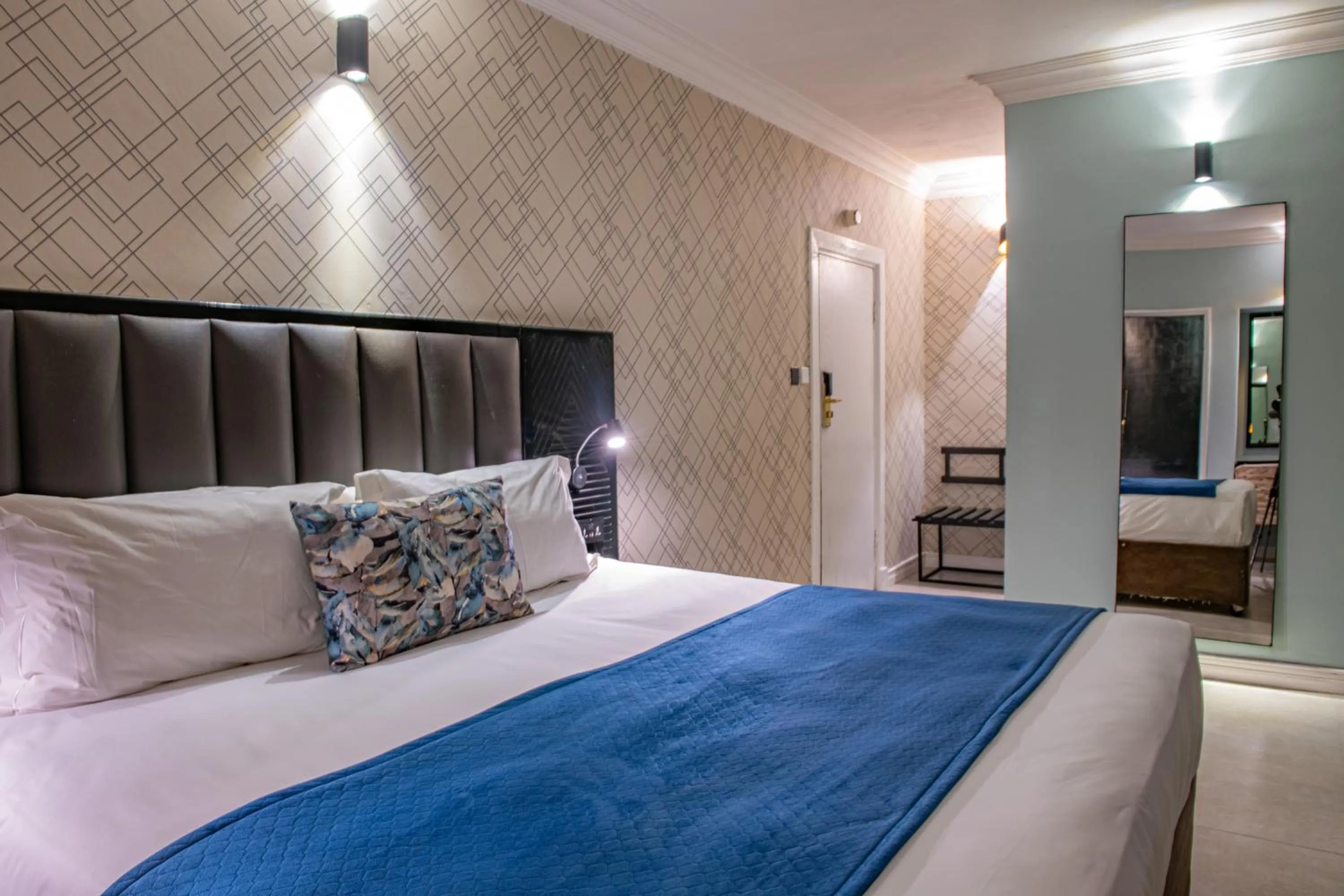 Bed in New Ambassador Hotel