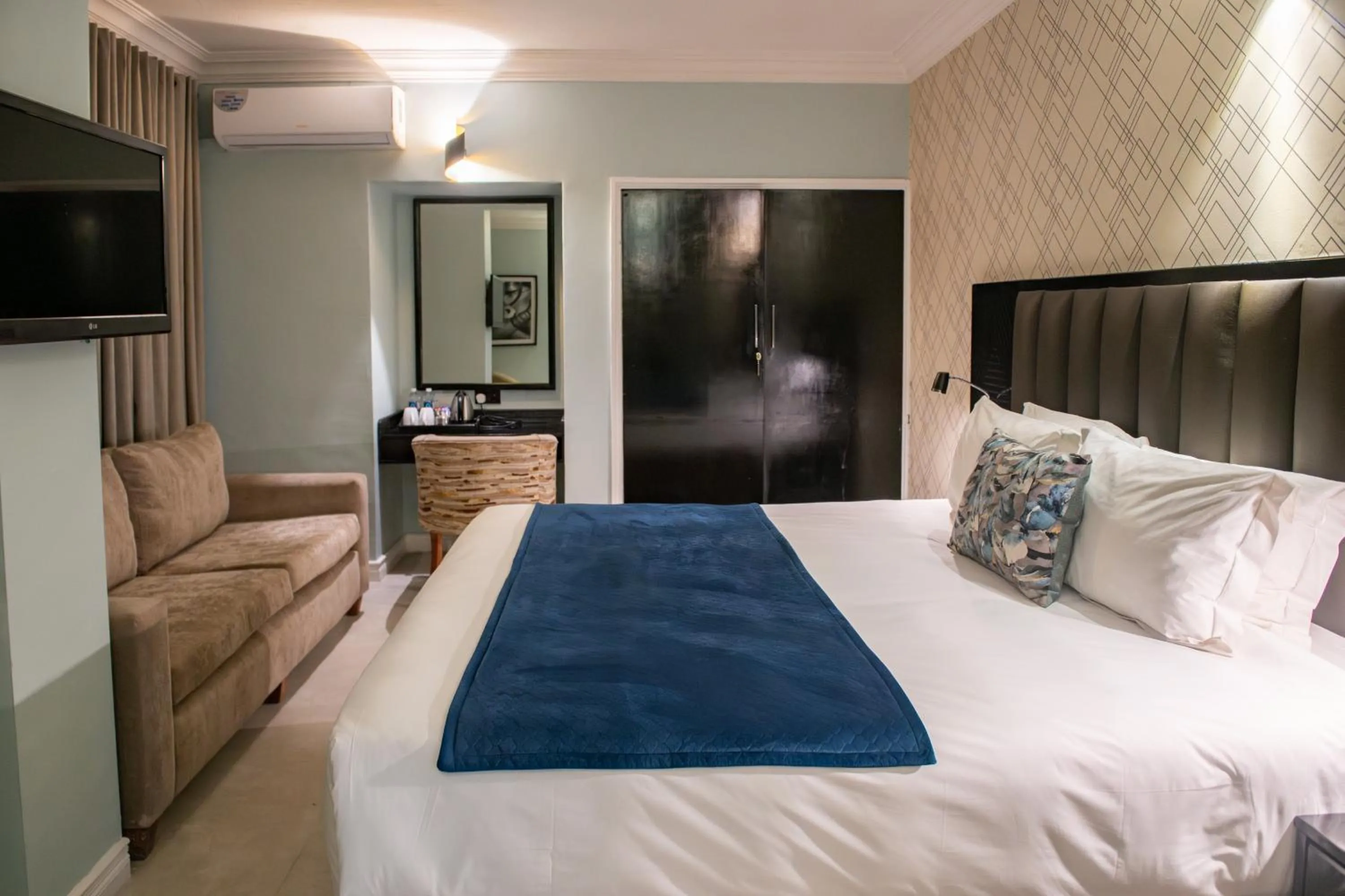 Bed in New Ambassador Hotel