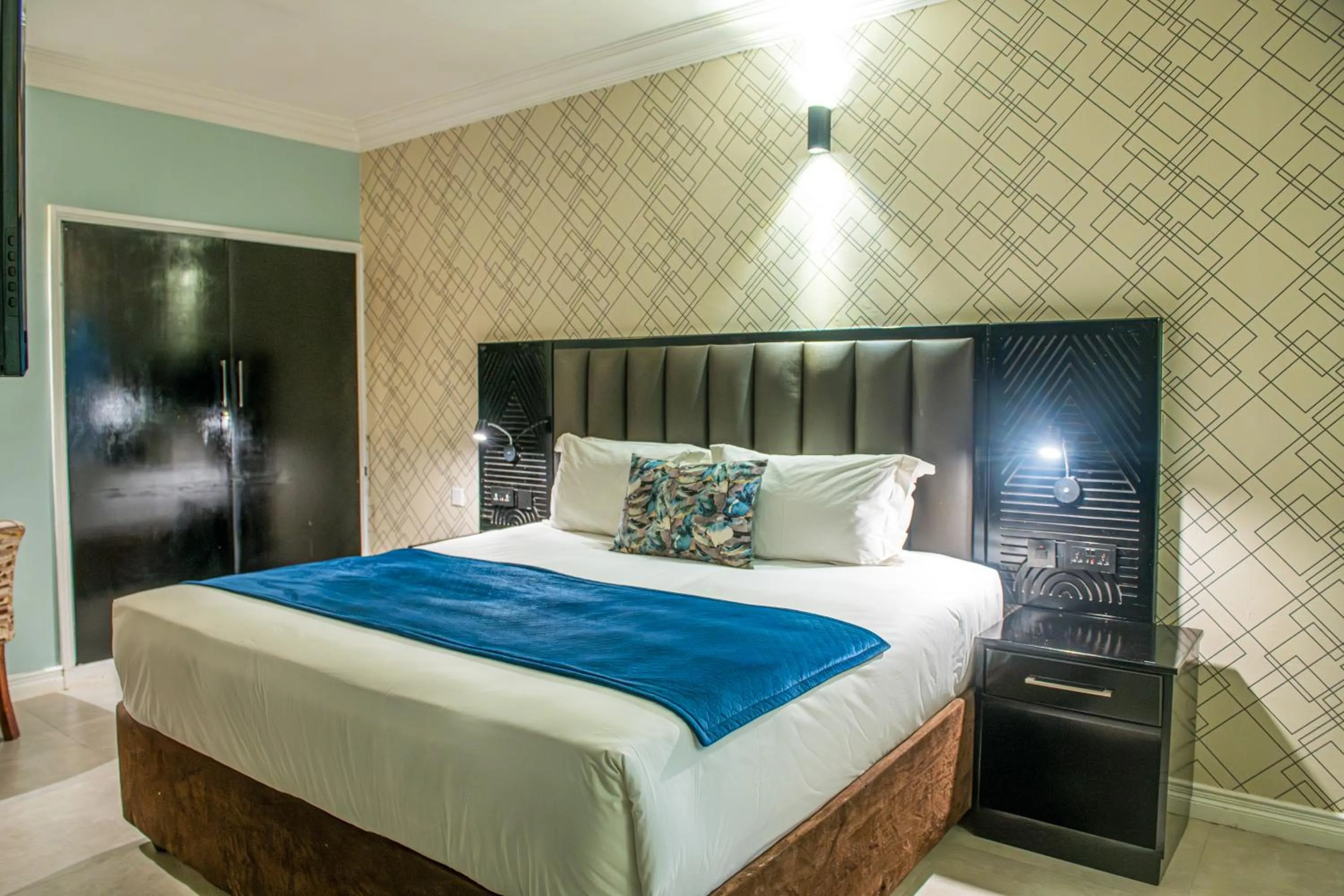 Bed in New Ambassador Hotel