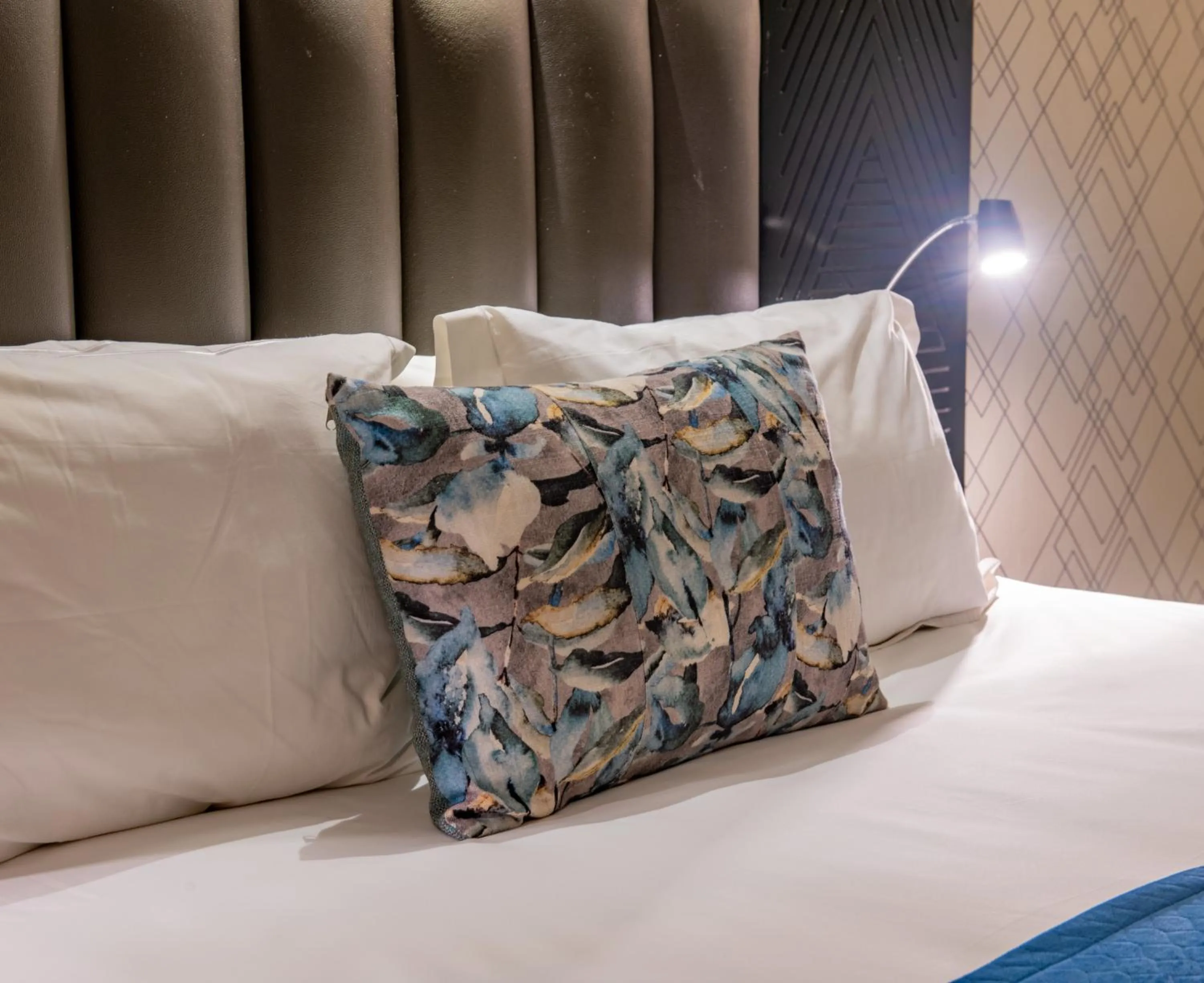 Bed in New Ambassador Hotel