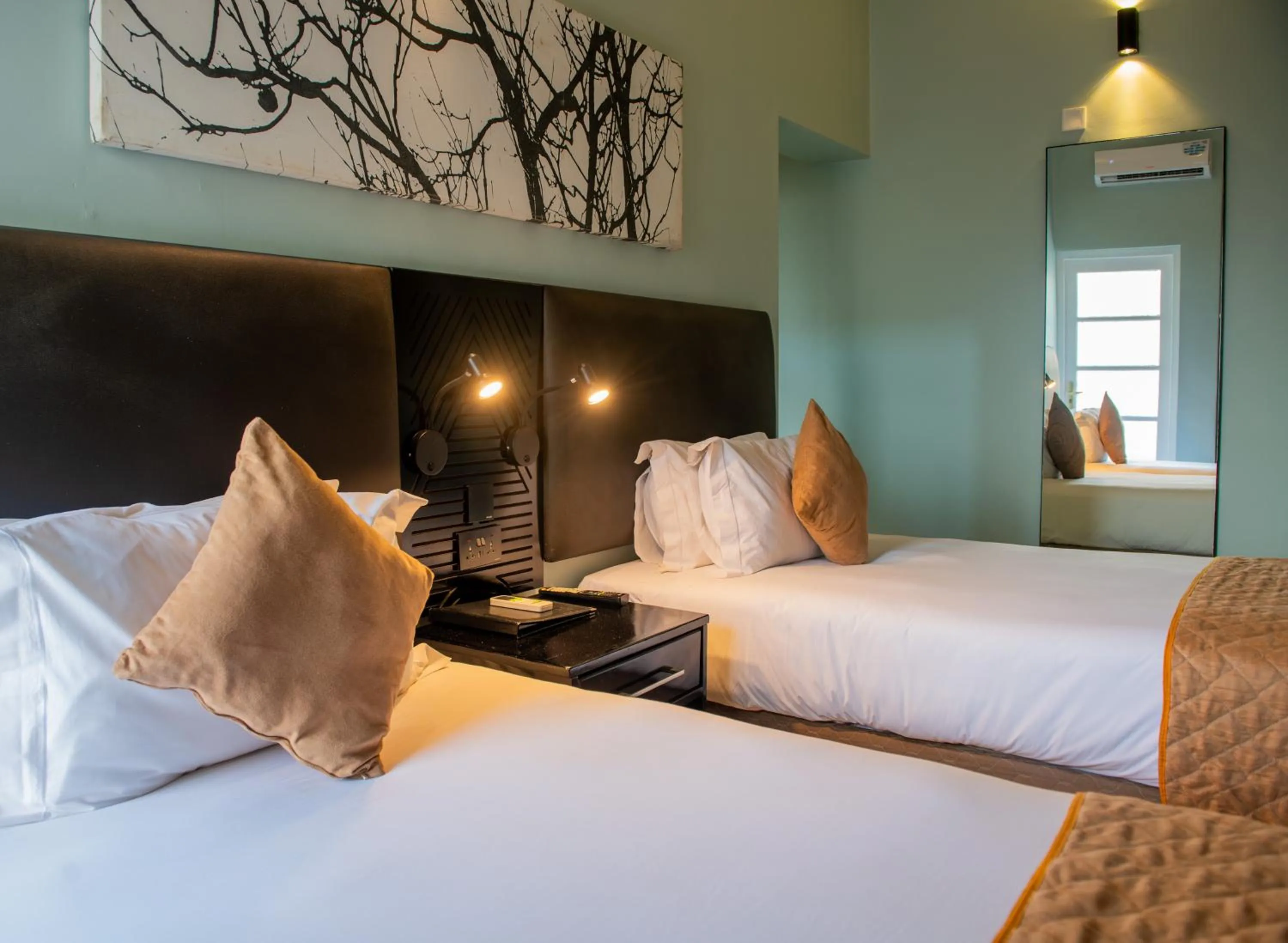 Bed in New Ambassador Hotel