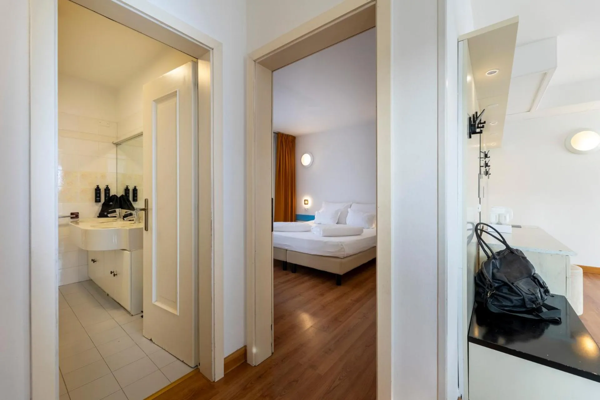 Bedroom, Bed in Hi Hotels Riva del Garda