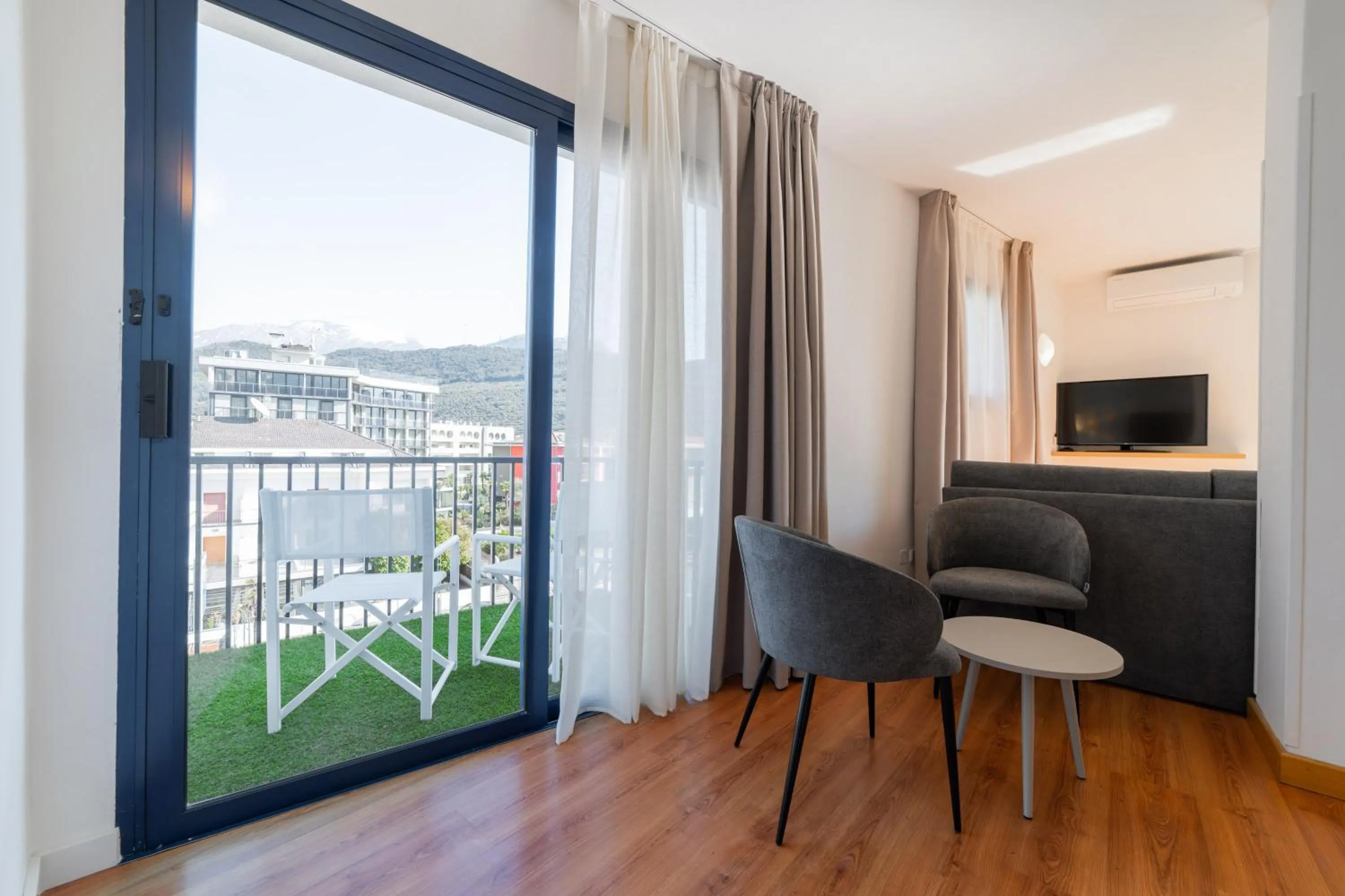 Bedroom in Hi Hotels Riva del Garda