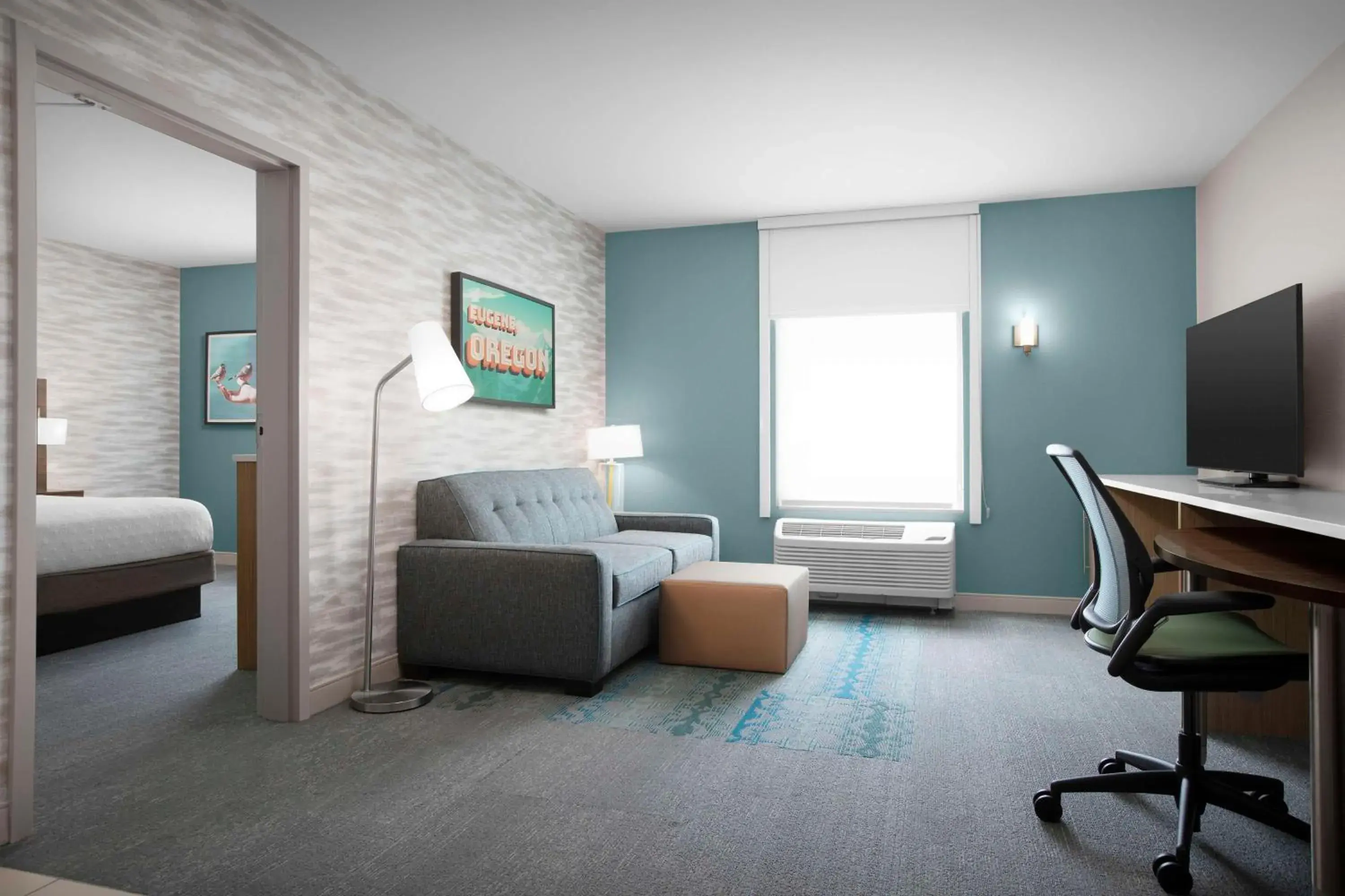 Living room, Bed in Home2 Suites by Hilton Eugene Downtown University Area Living room, Bed in Home2 Suites by Hilton Eugene Downtown University Area