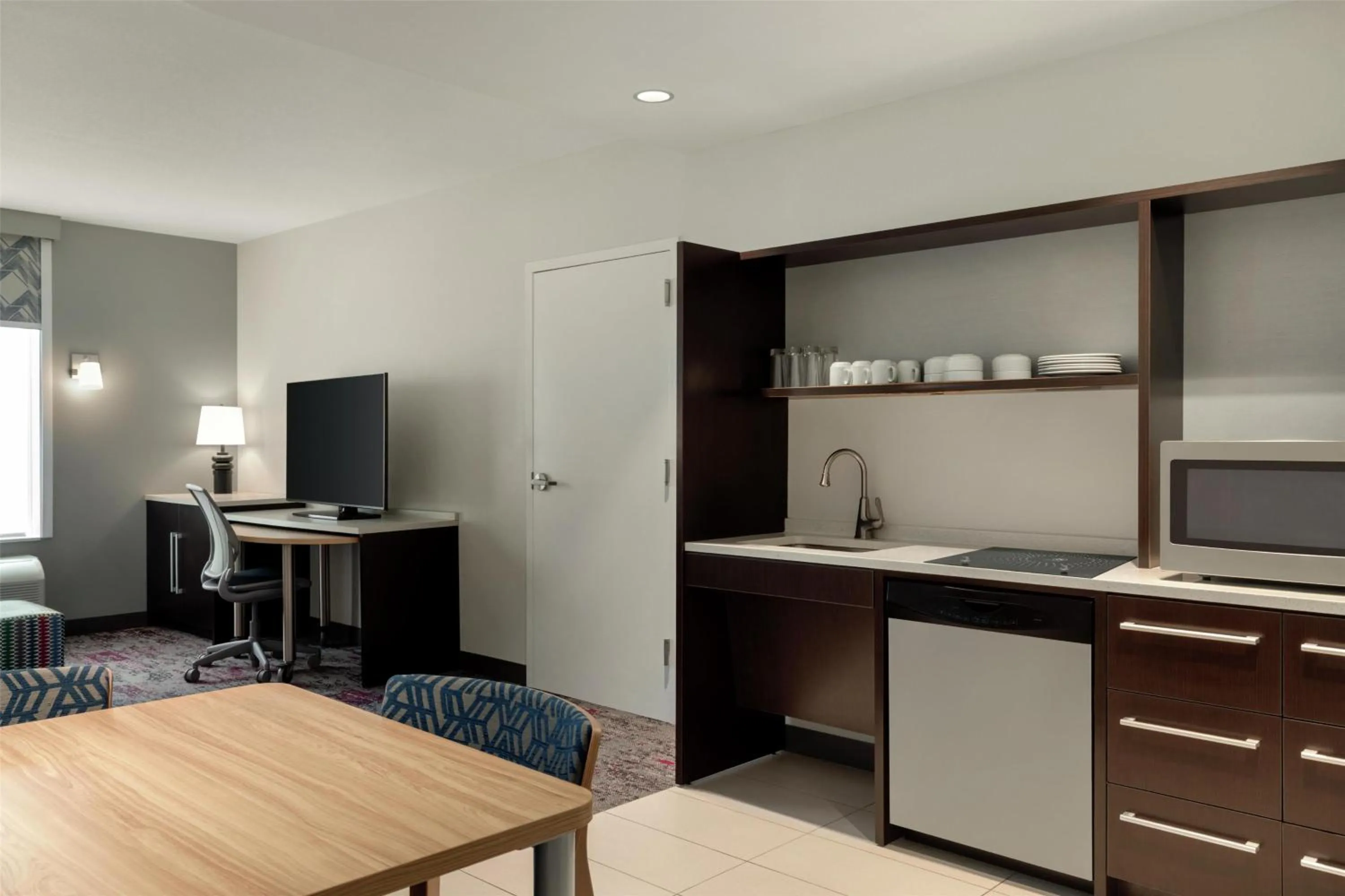 Kitchen or kitchenette in Home2 Suites by Hilton Houston Energy Corridor
