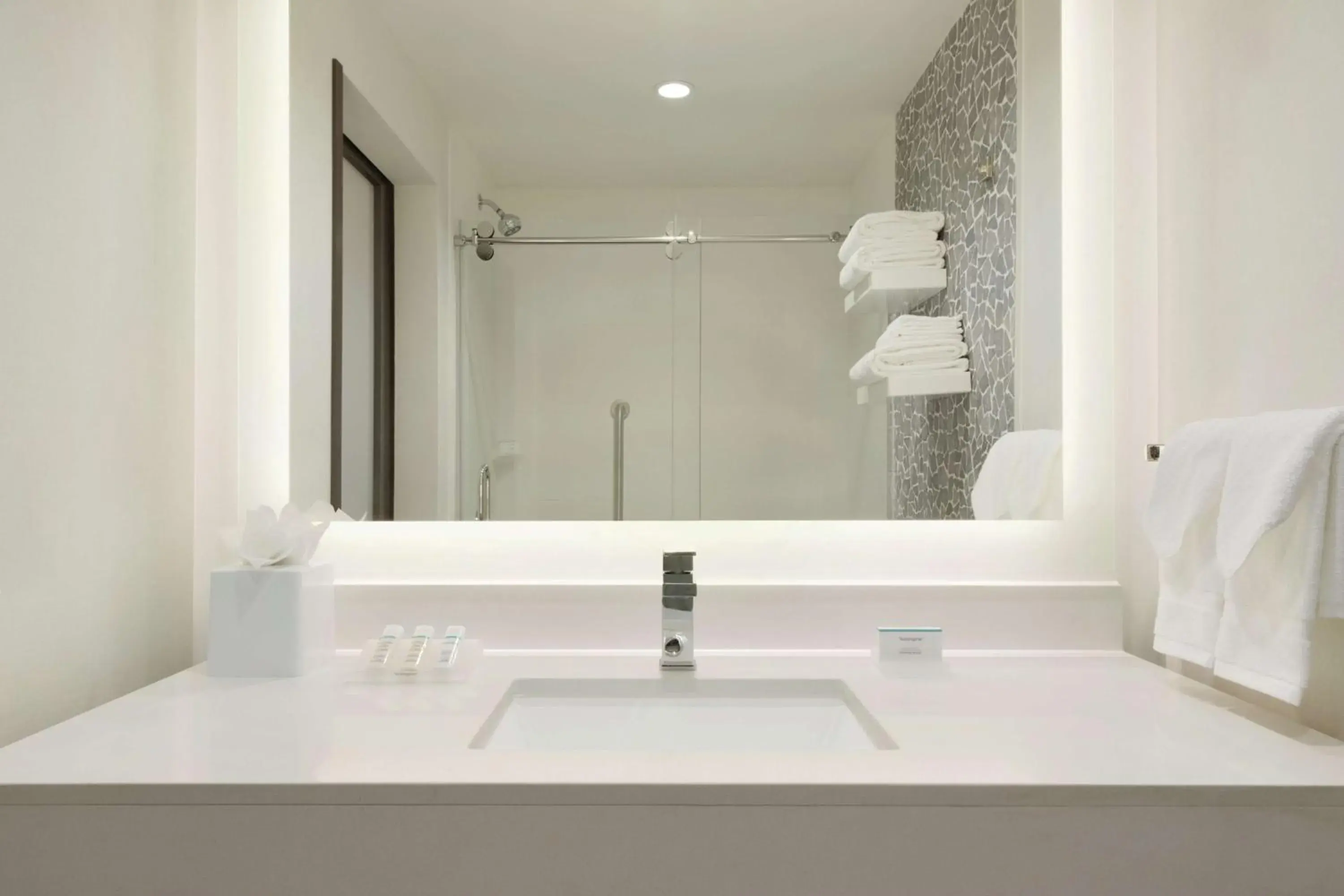 Bathroom in Hilton Garden Inn Calgary Downtown Bathroom in Hilton Garden Inn Calgary Downtown