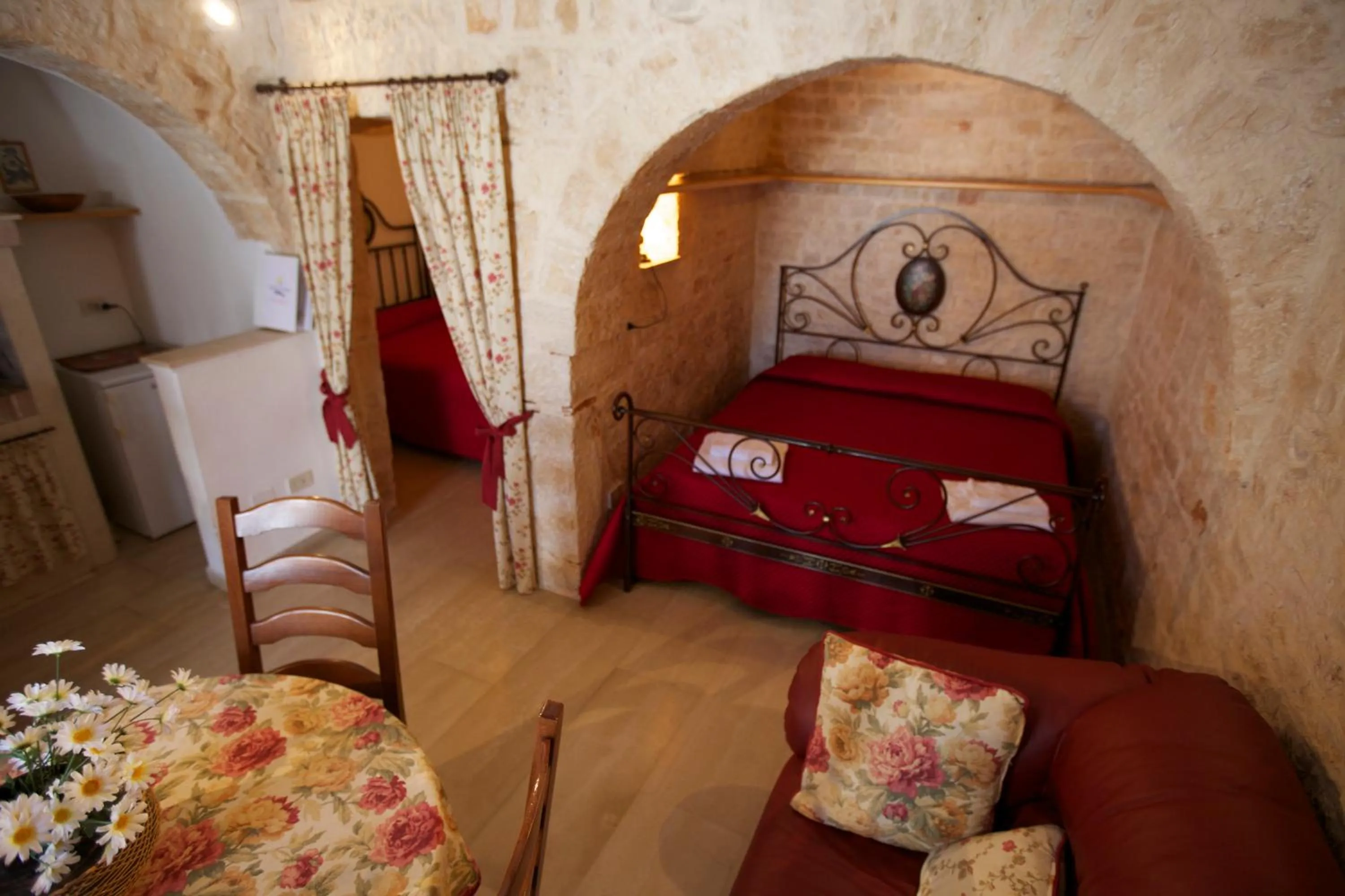 Living room, Bed in Trulli e Puglia Resort