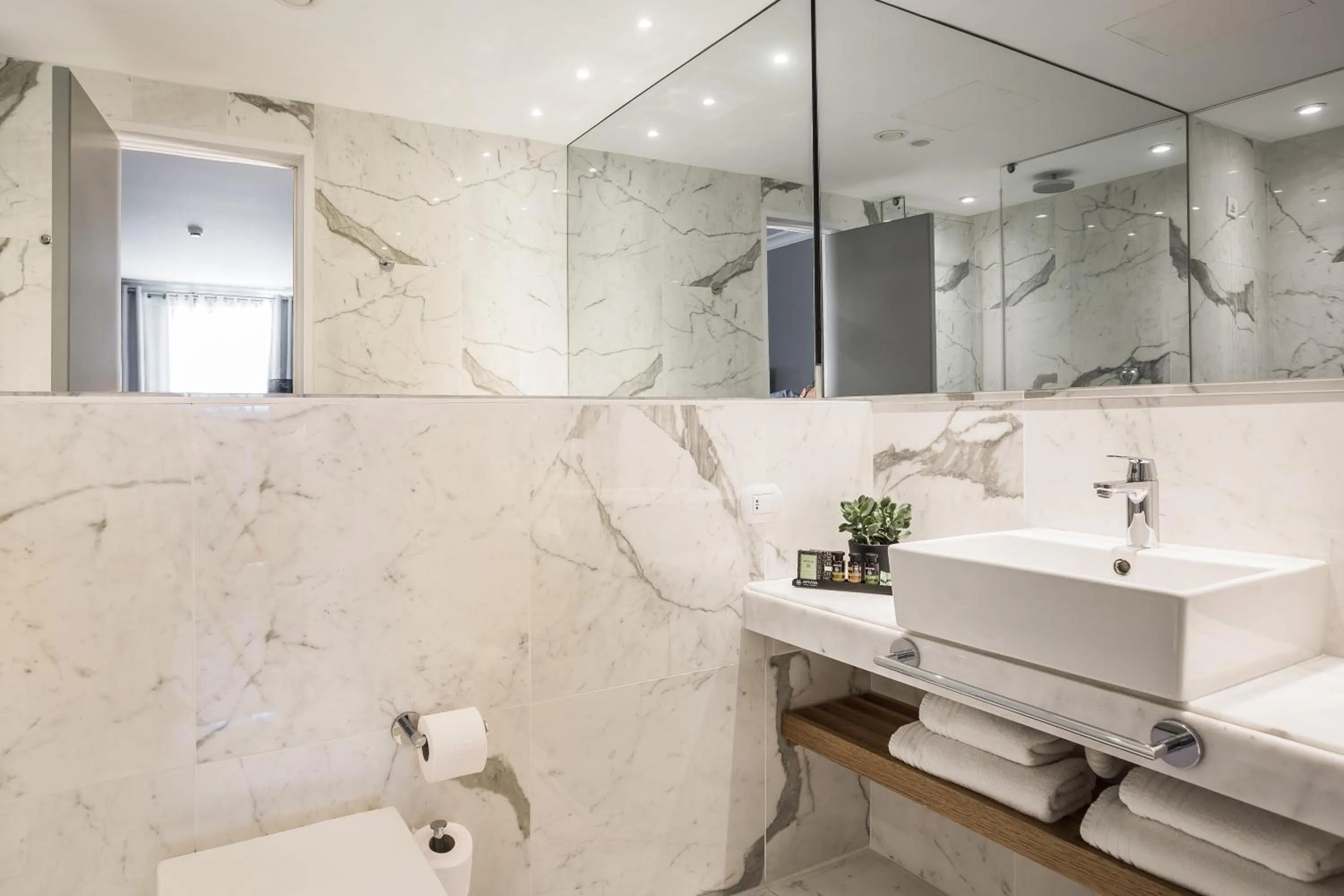 Bathroom in Aenos Hotel