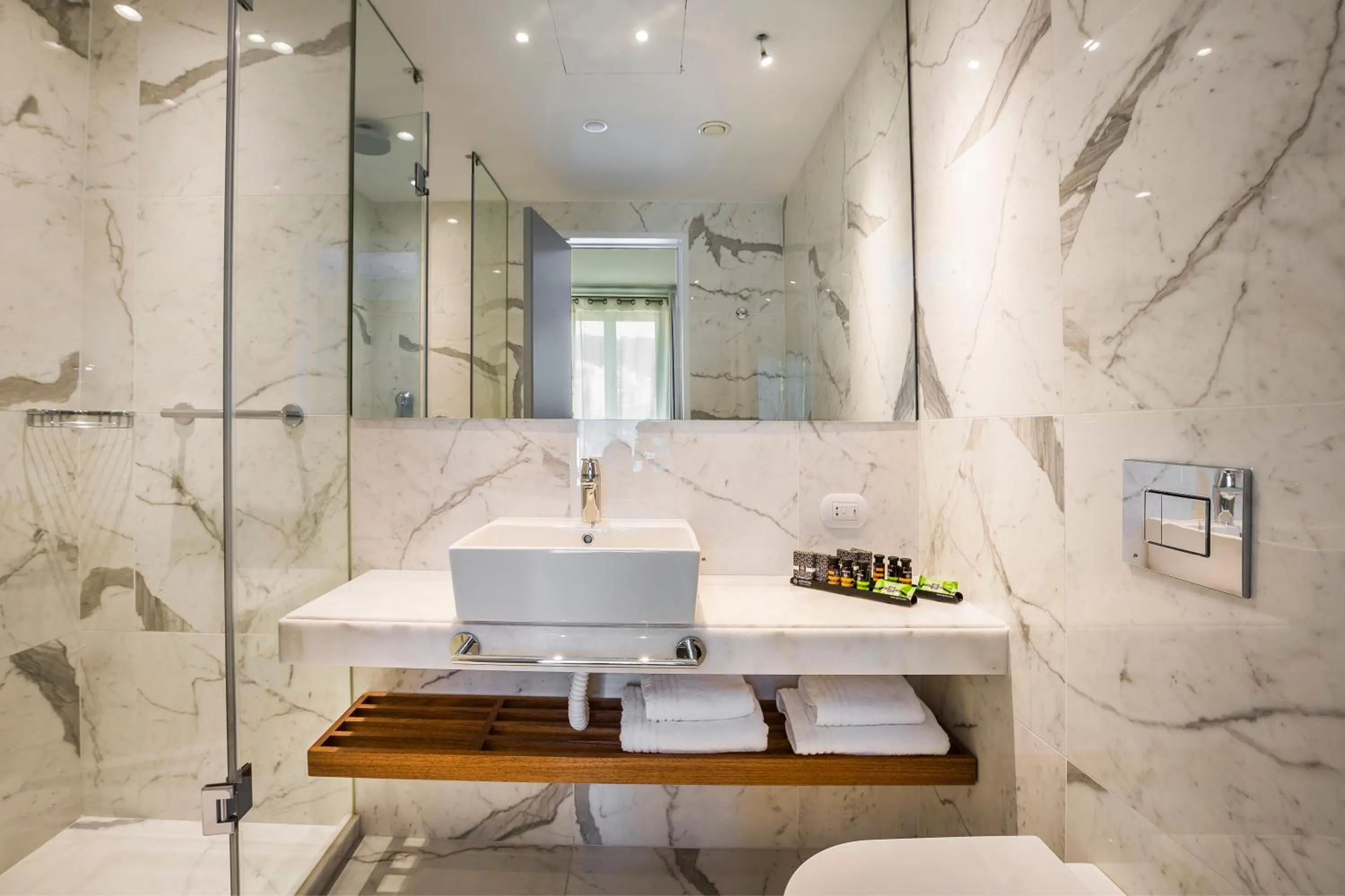 Bathroom in Aenos Hotel