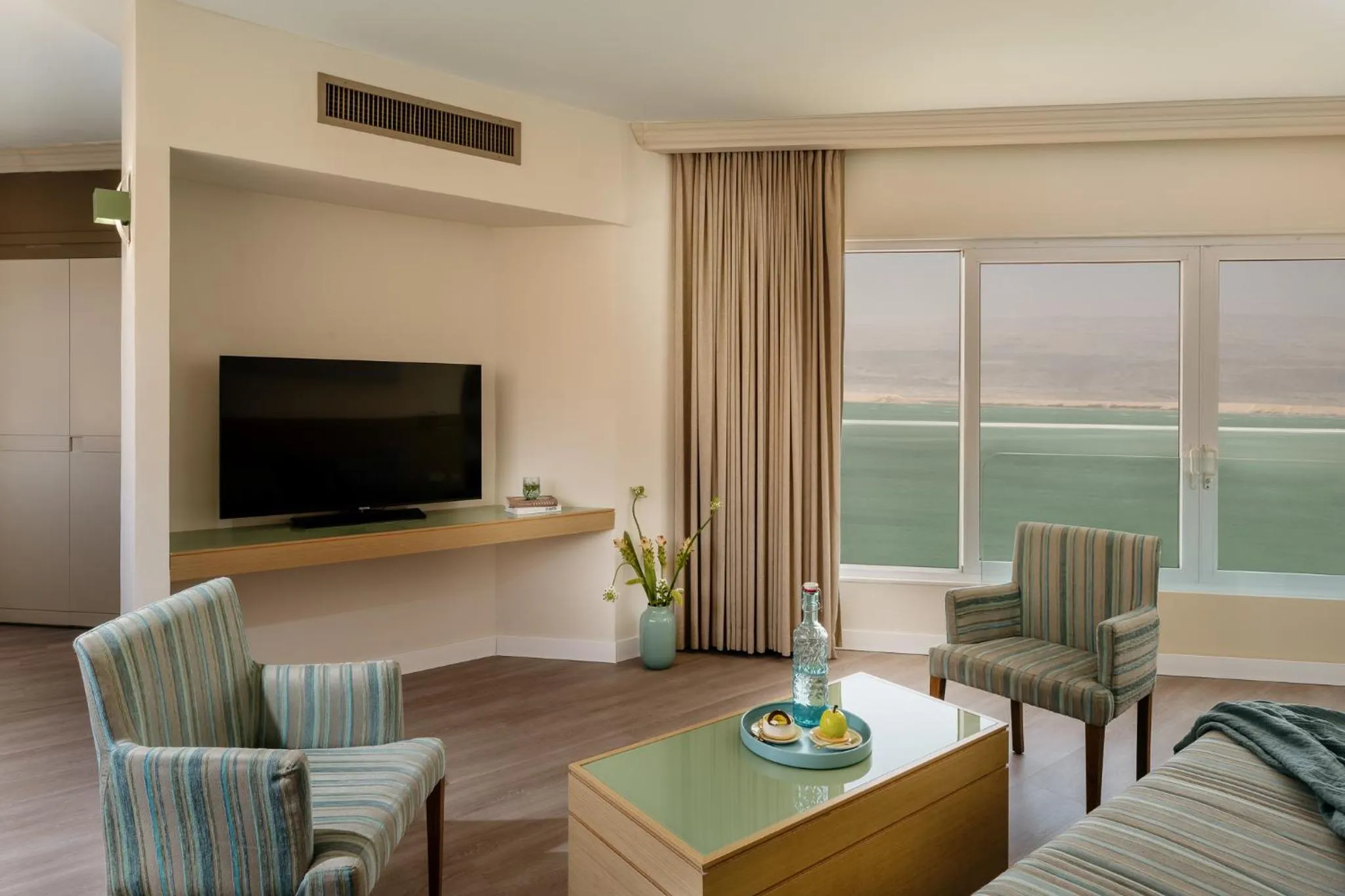 Living room in Vert Dead Sea by AFI Hotels