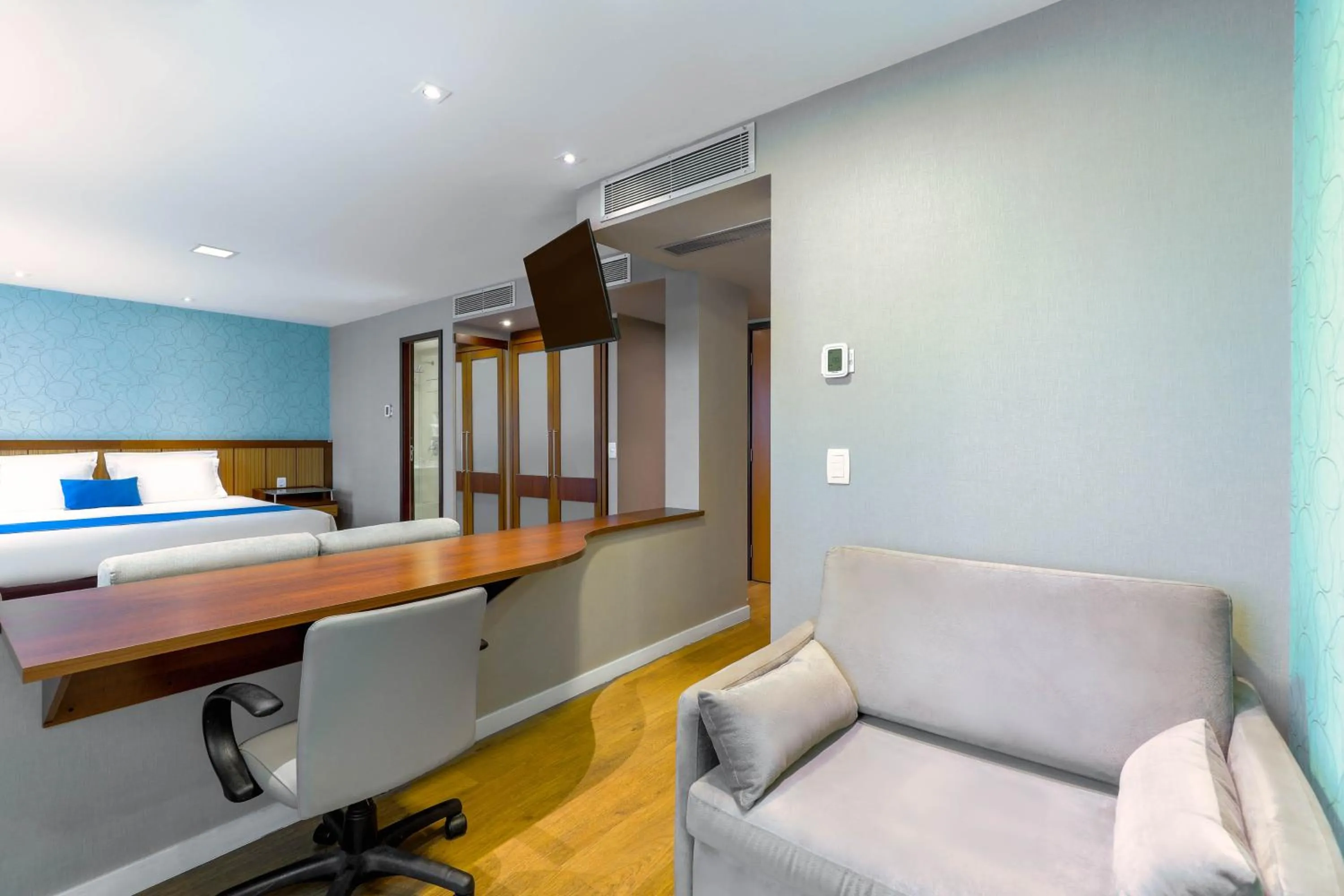 Bed in Wyndham Sao Paulo Ibirapuera Convention Plaza