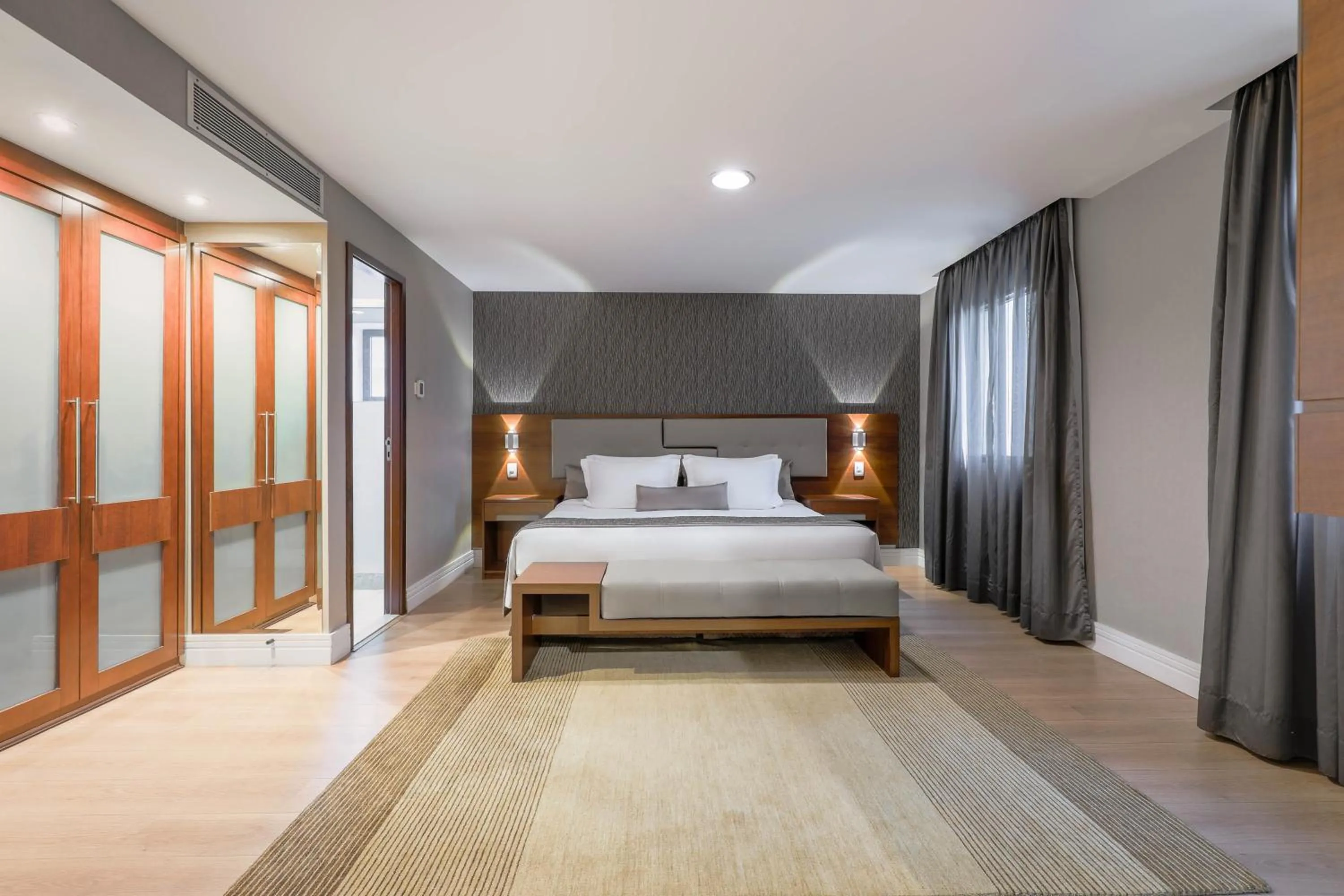 Bed in Wyndham Sao Paulo Ibirapuera Convention Plaza