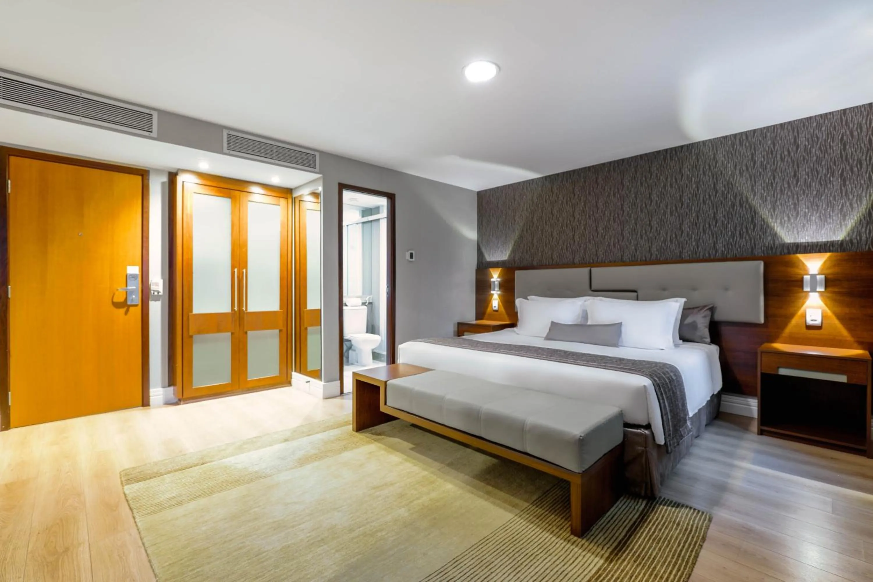 Bed in Wyndham Sao Paulo Ibirapuera Convention Plaza