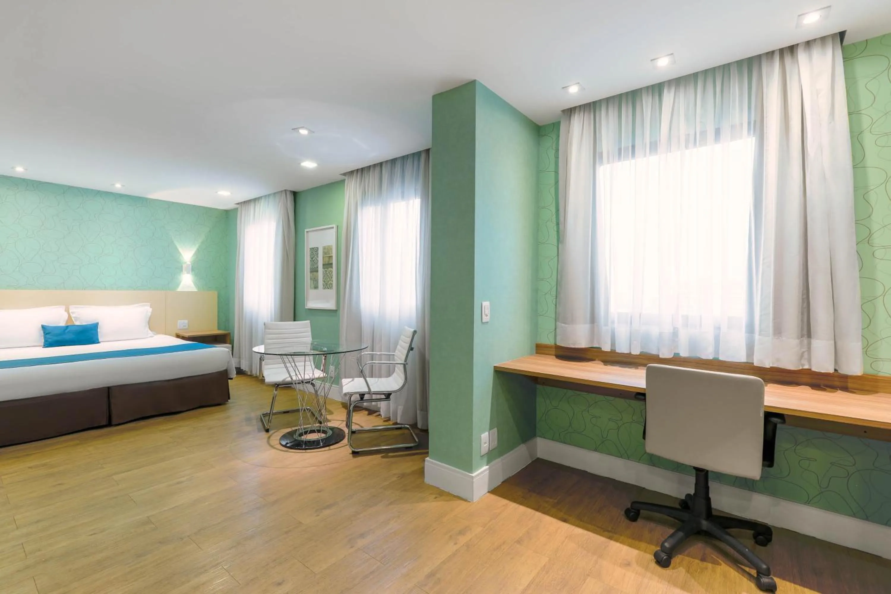 Bed in Wyndham Sao Paulo Ibirapuera Convention Plaza