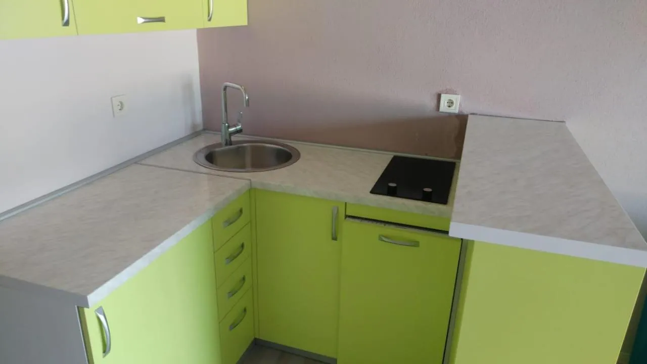 Kitchen or kitchenette in Apartman Bećir
