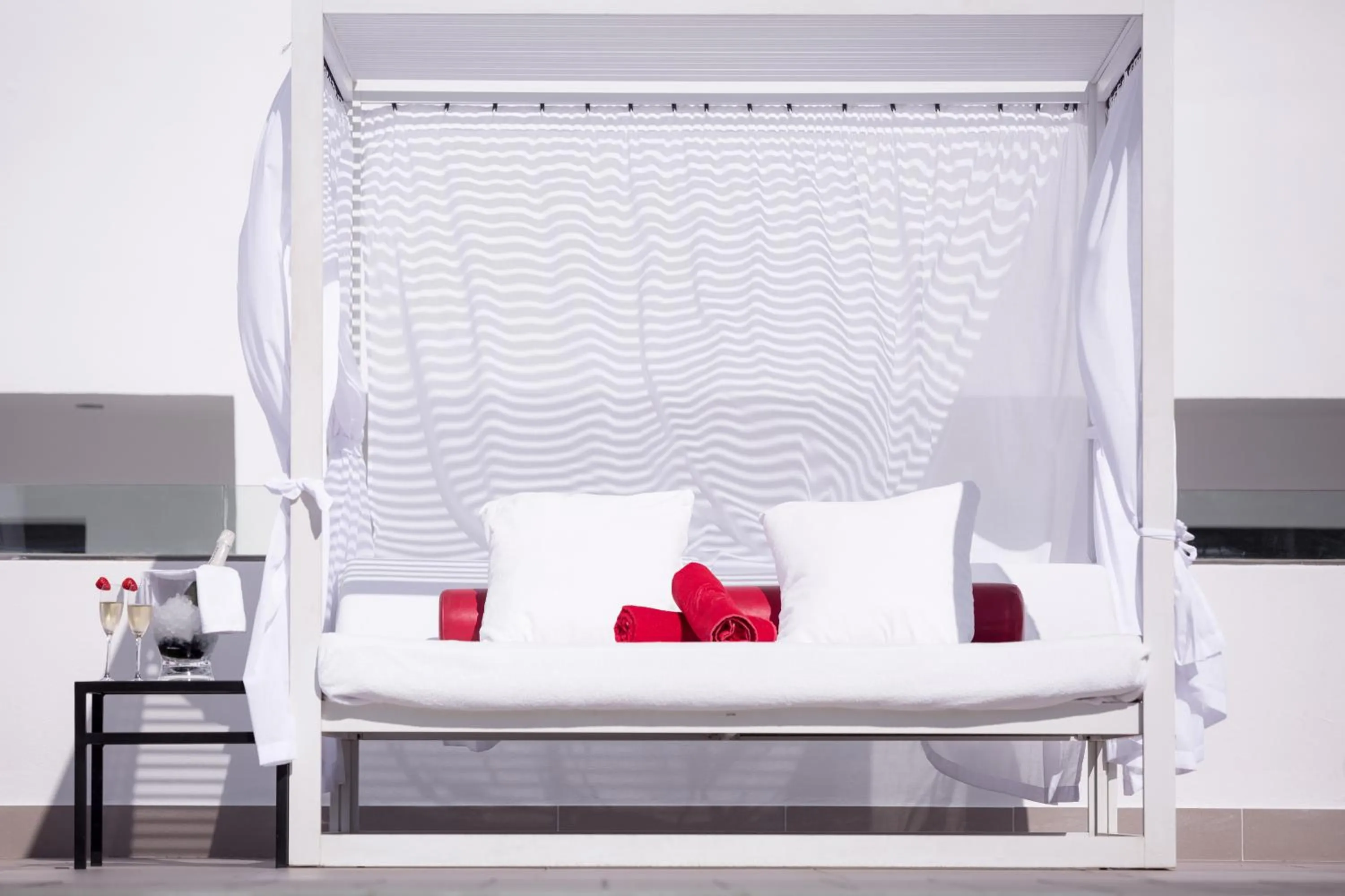 Swimming pool, Bed in Migjorn Ibiza Suites & Spa