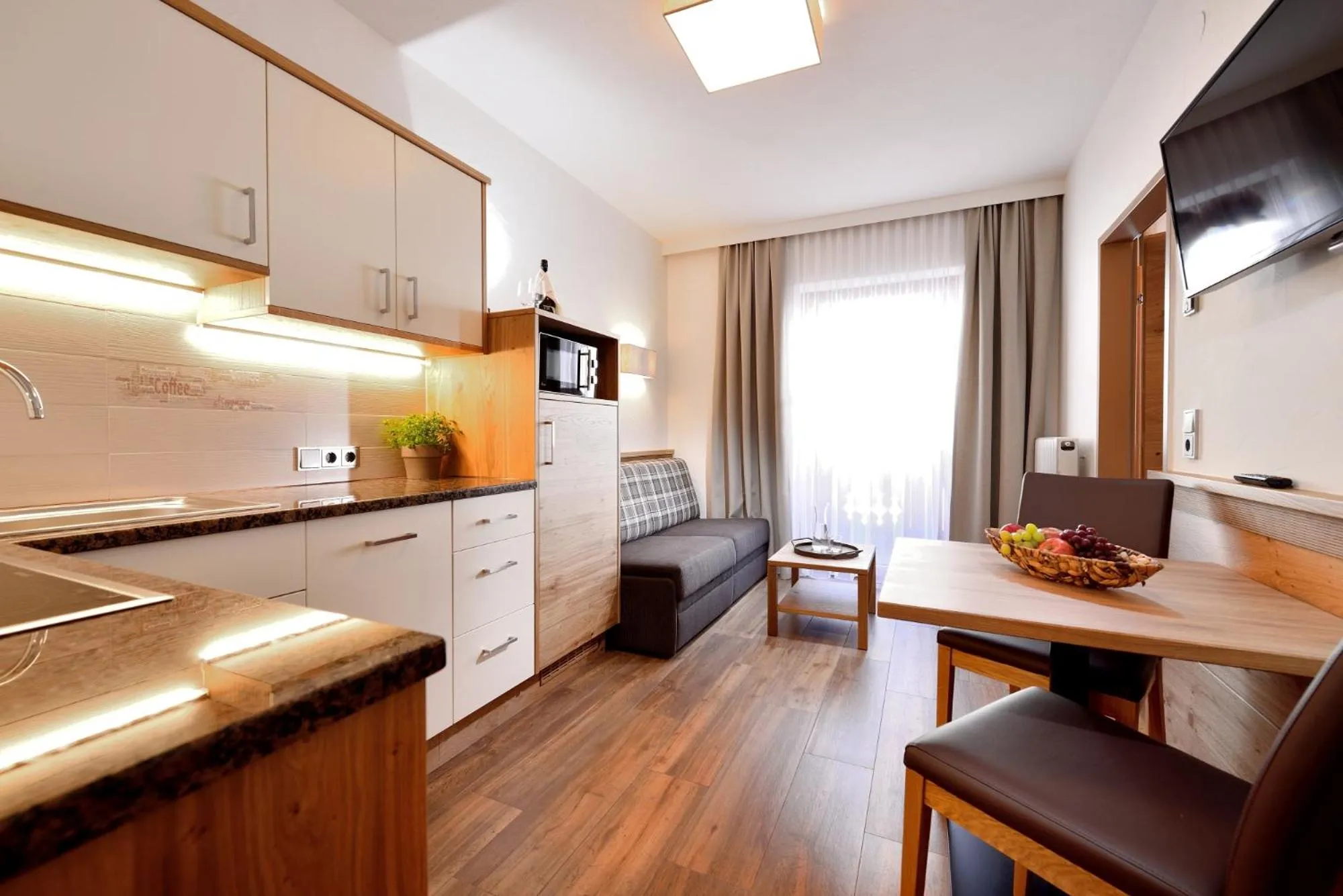 Kitchen or kitchenette in Aparthotel Garni Monte