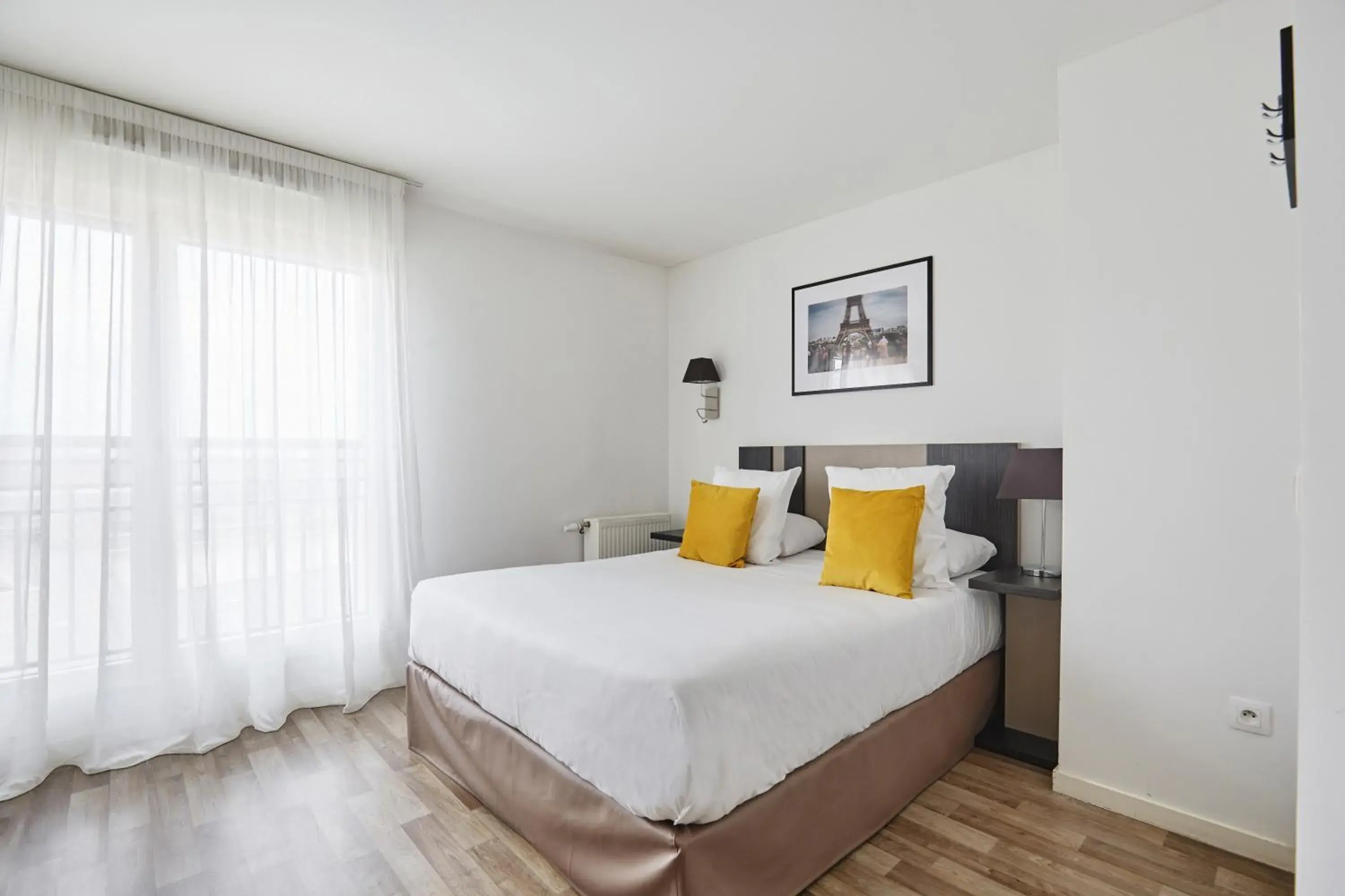 Bedroom, Bed in Appart Hotel Odalys City Paris Levallois Bedroom, Bed in Appart Hotel Odalys City Paris Levallois