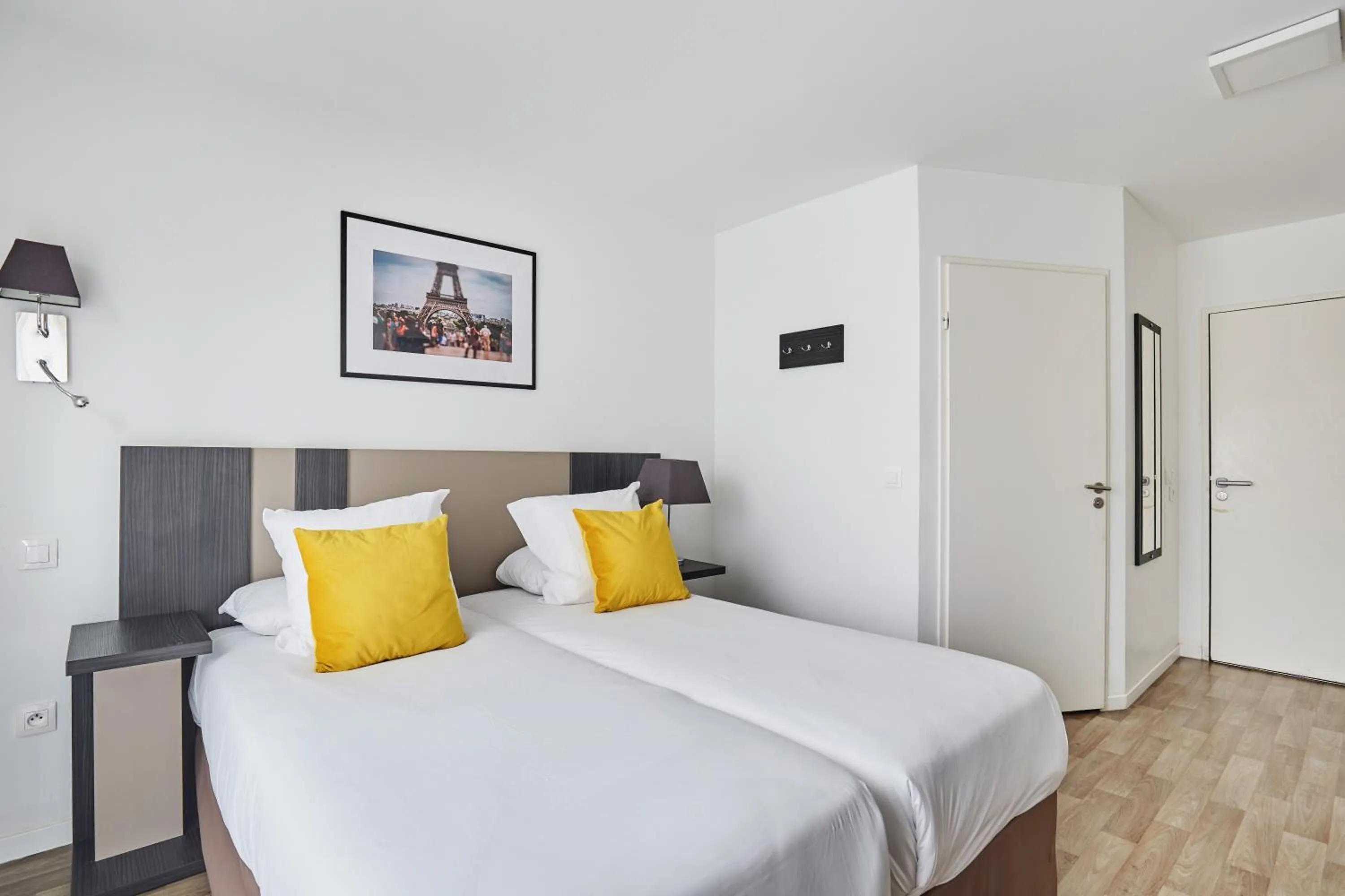 Bedroom, Bed in Appart Hotel Odalys City Paris Levallois