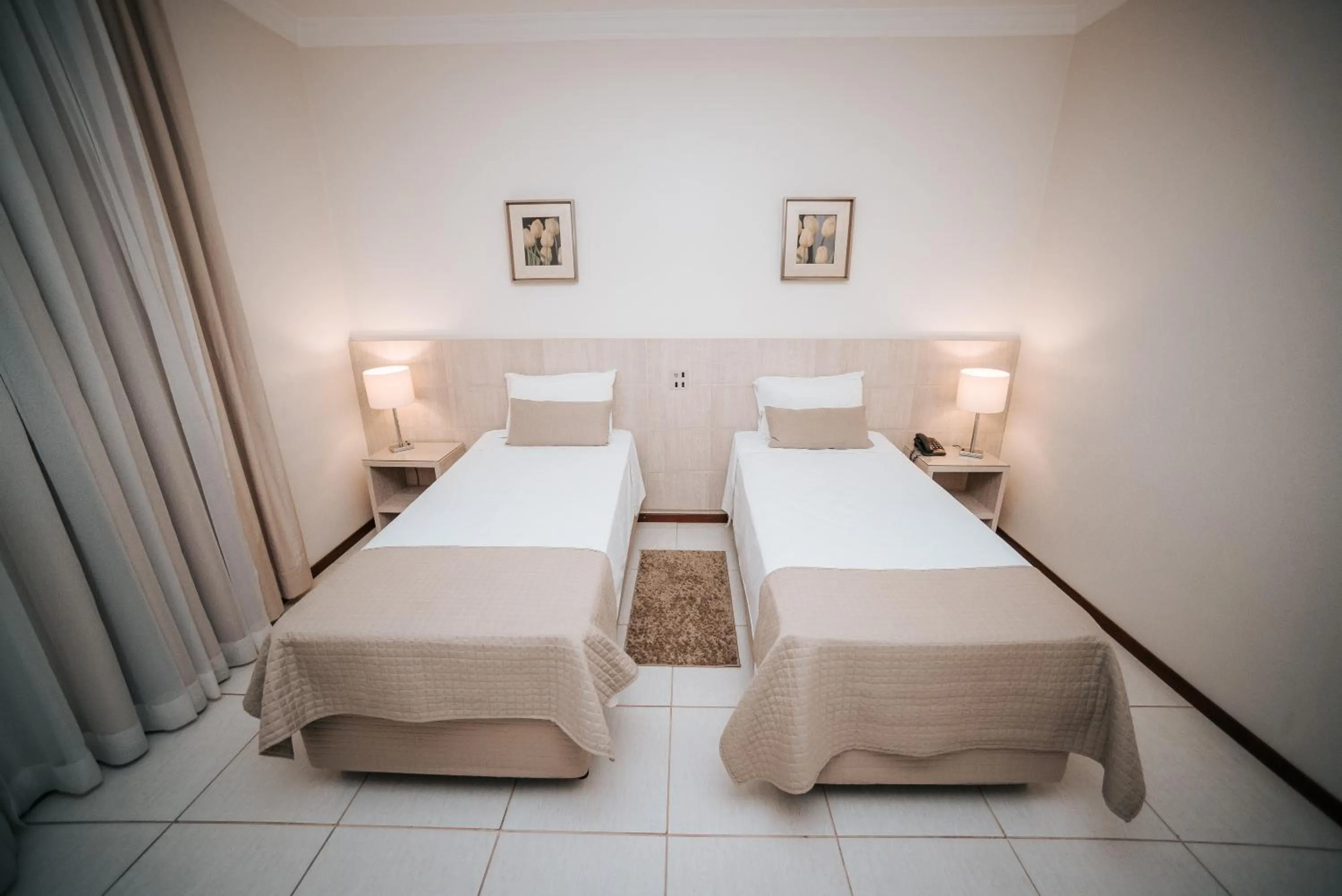 Bed in Aruá Hotel, Restaurante e Convenções