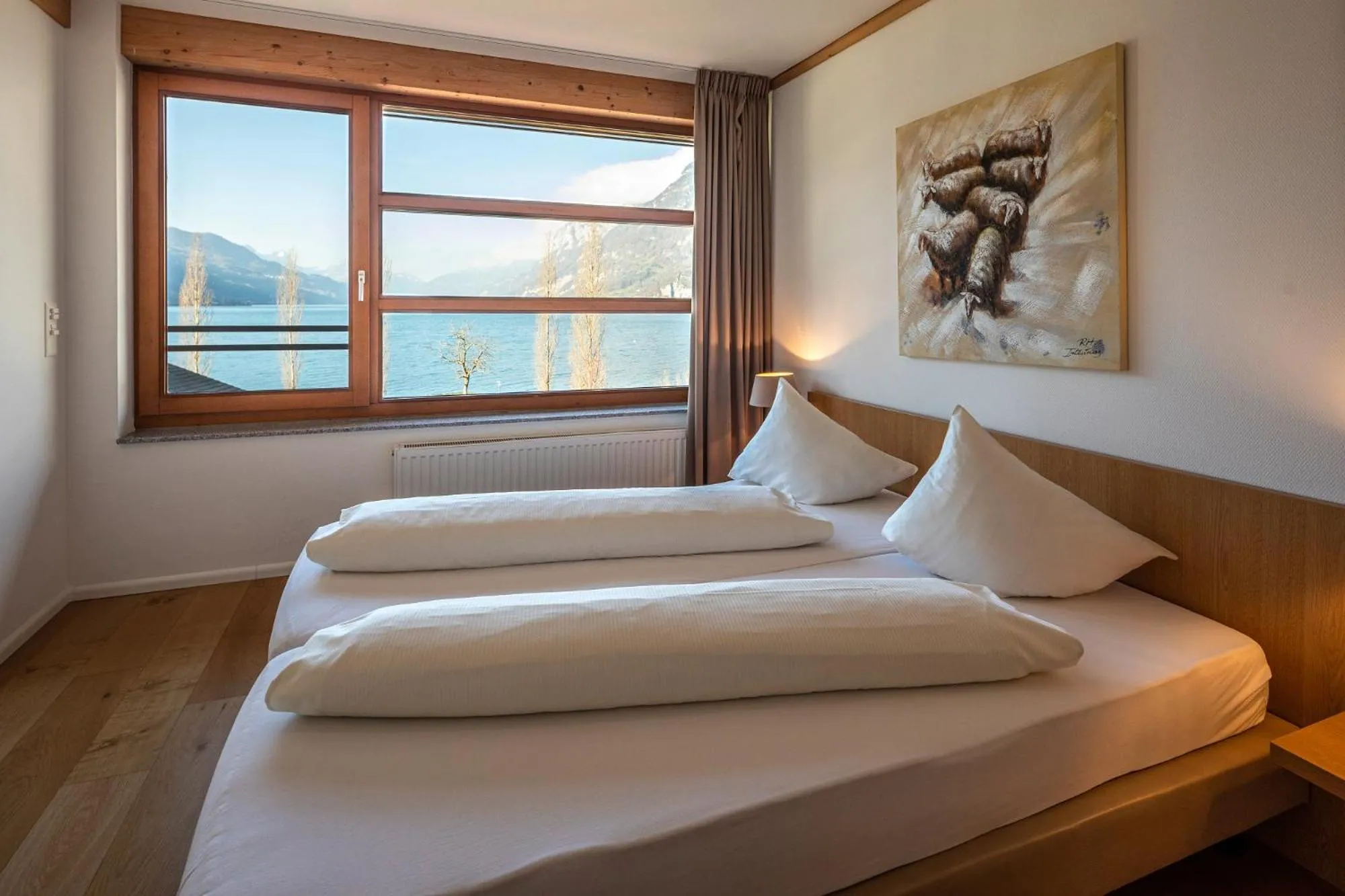 Photo of the whole room, Bed in Marina Walensee Hotel