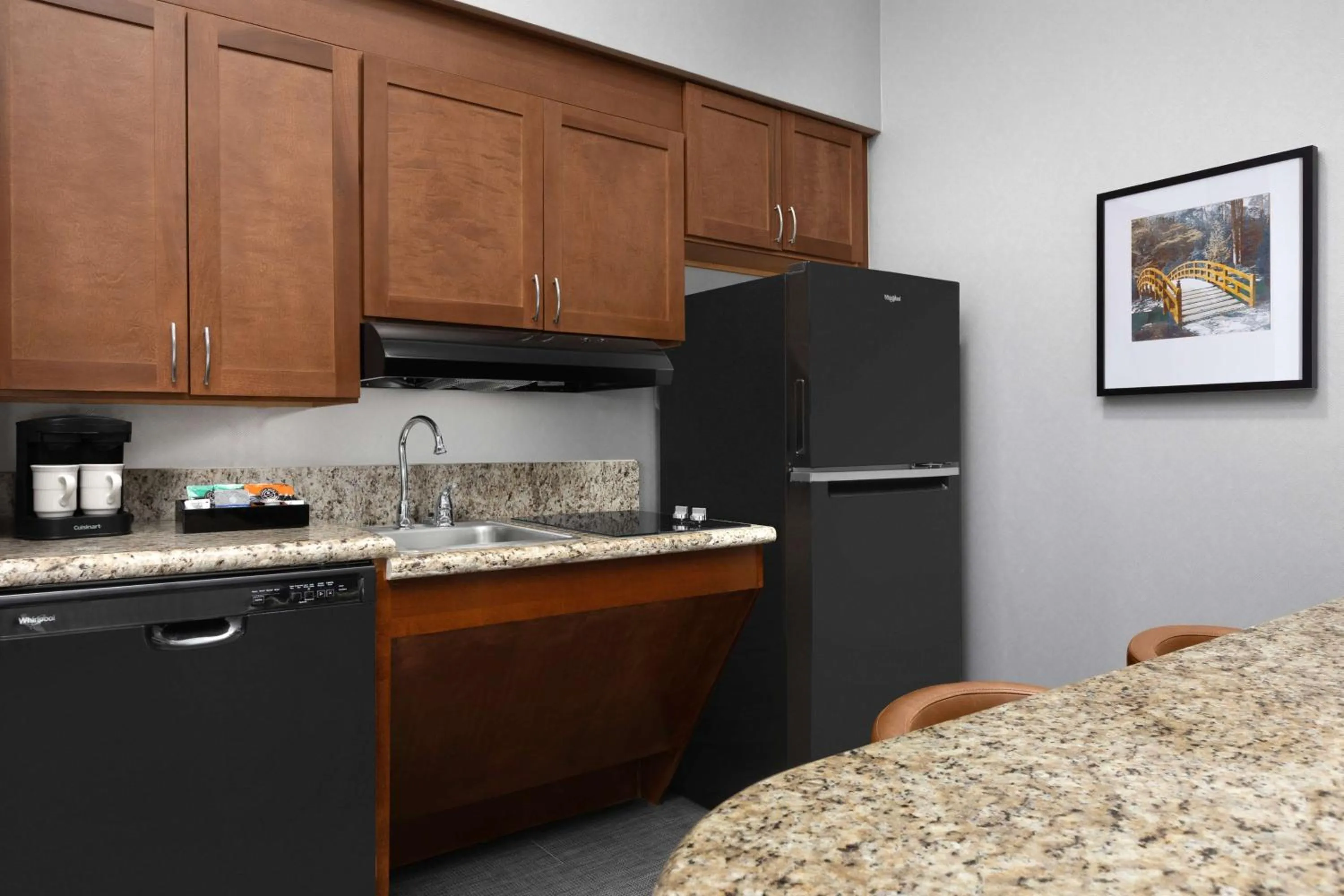 Kitchen or kitchenette in Homewood Suites by Hilton Raleigh-Durham Airport at RTP