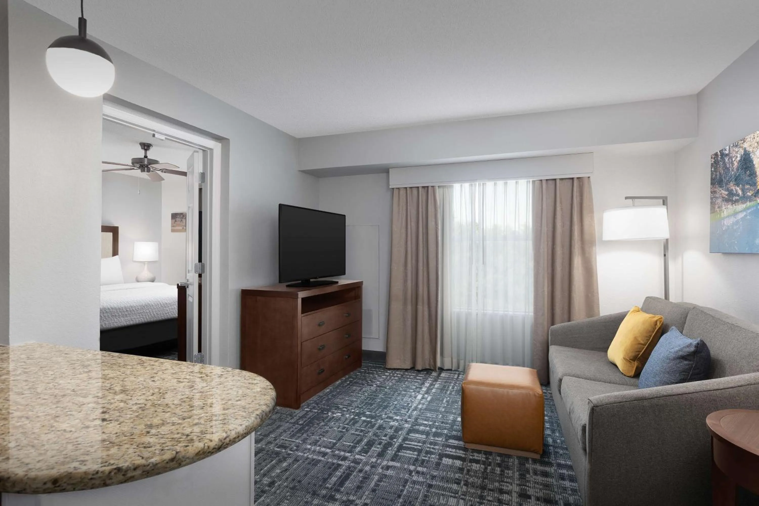 Living room, Bed in Homewood Suites by Hilton Raleigh-Durham Airport at RTP