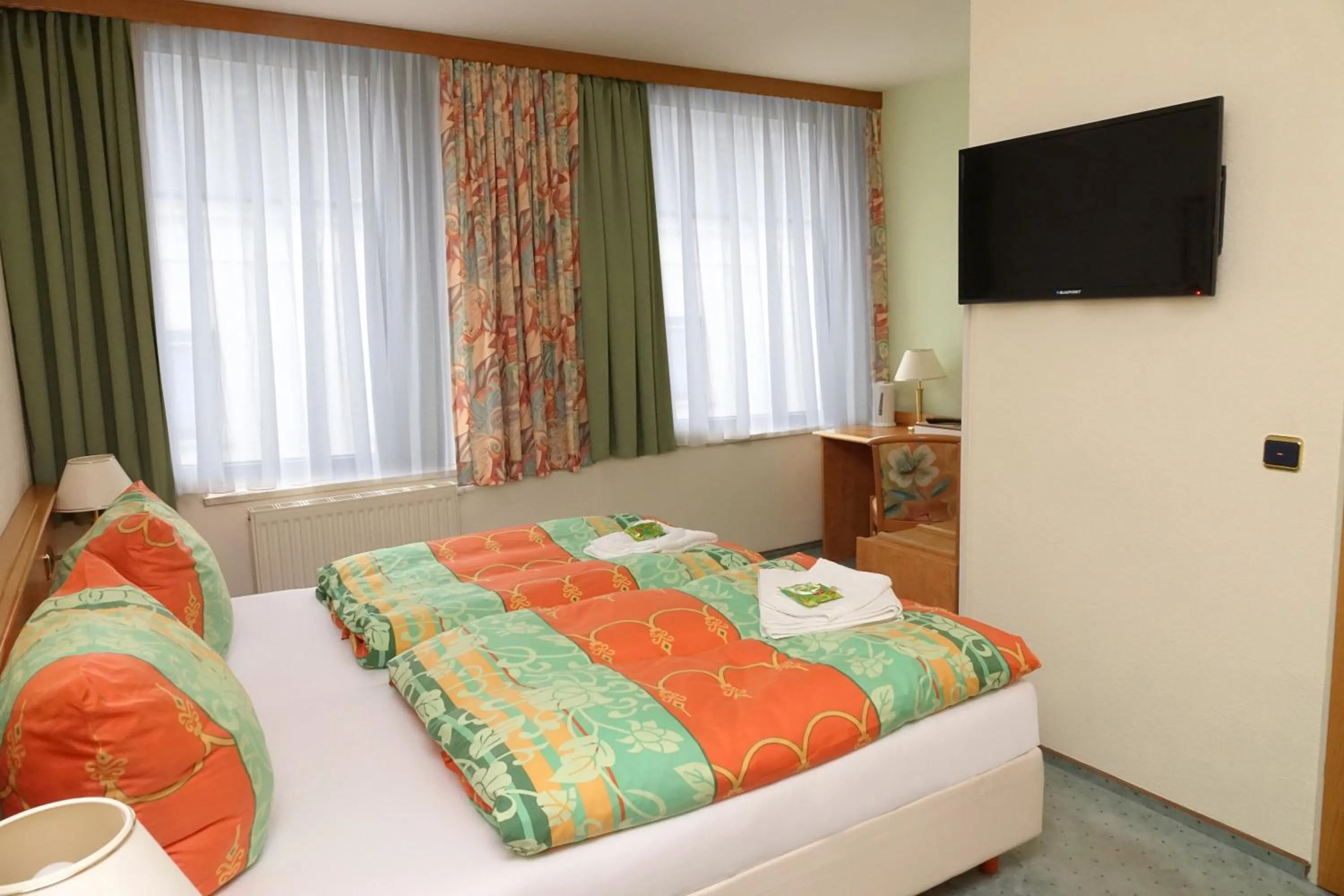 Photo of the whole room, Bed in Hotel Zur Sonne