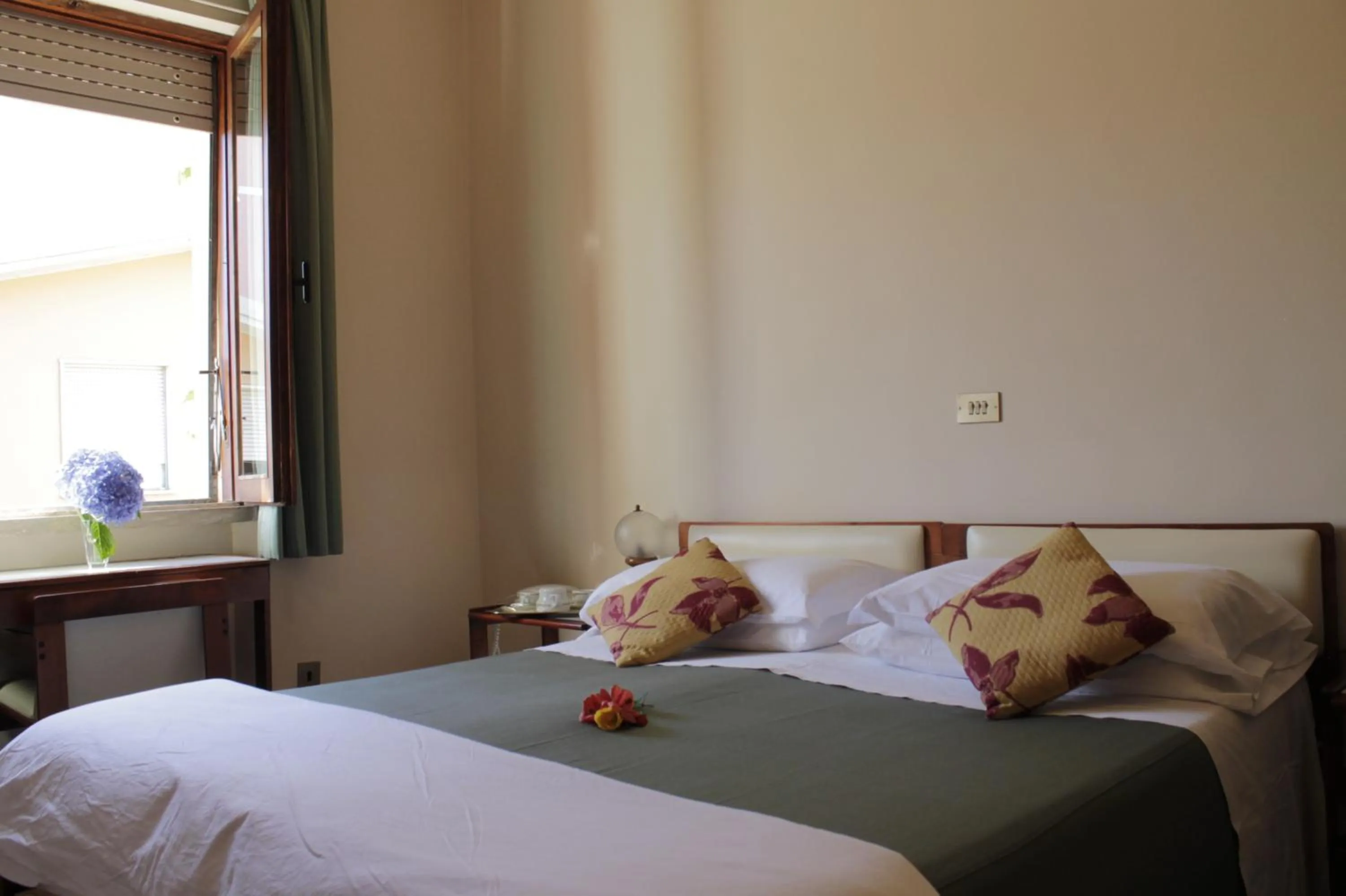 Bedroom in Hotel MariaLetizia