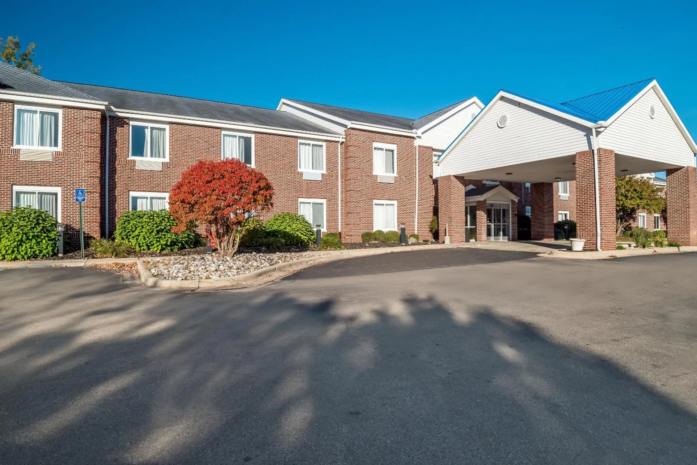 Property building in HomeTowne Studios by Red Roof East Lansing - Okemos