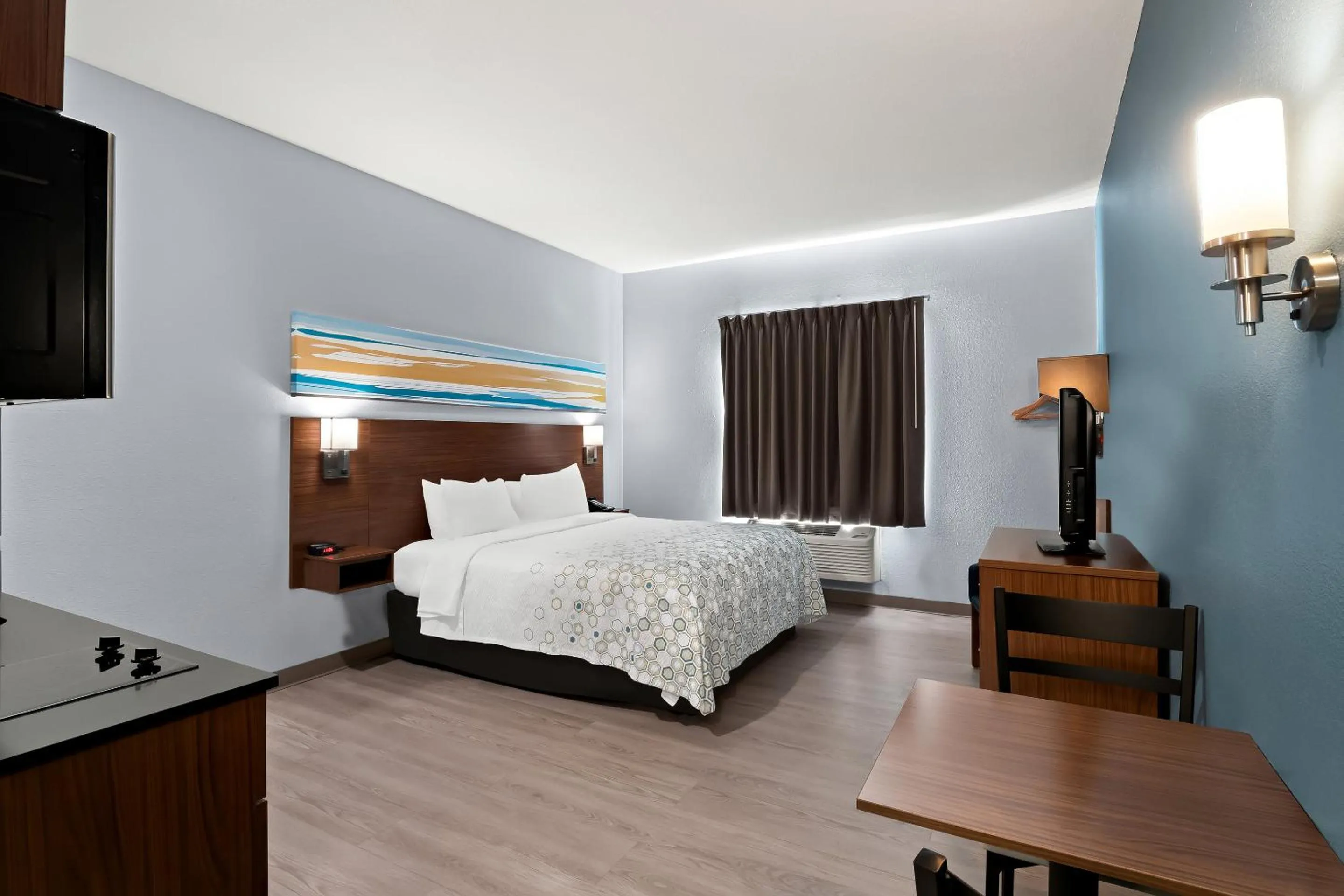 Photo of the whole room, Bed in HomeTowne Studios by Red Roof East Lansing - Okemos